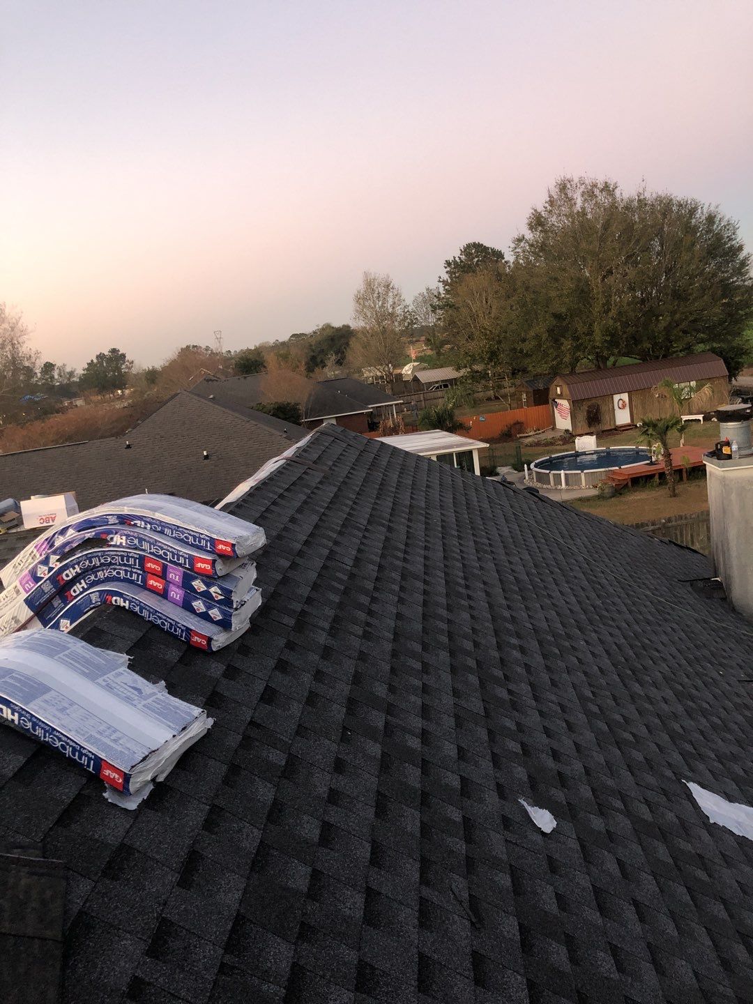 Residential Roofing Installation using Roof Replacement by American Roofing & Construction LLC