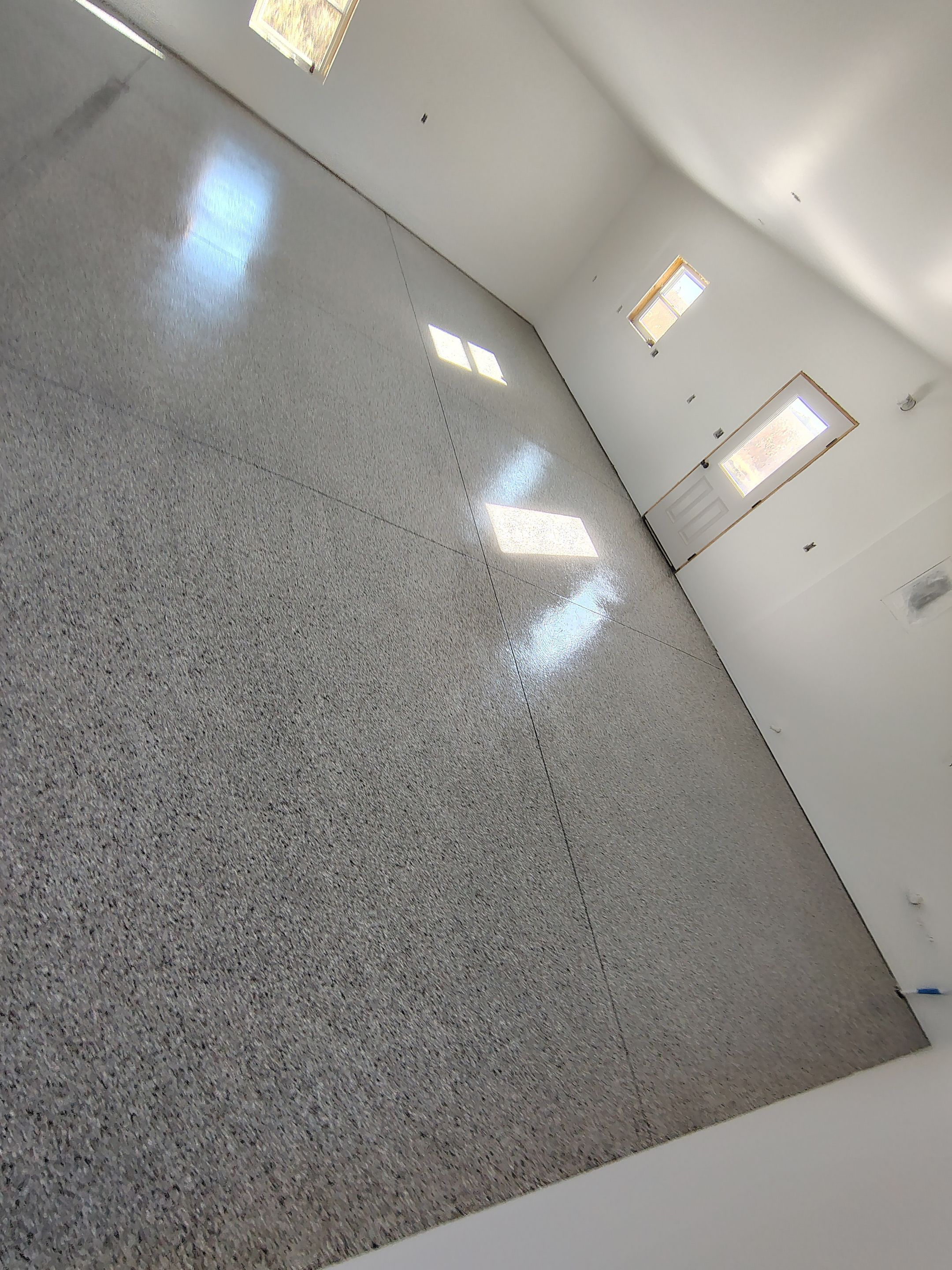 Custom Garage and Basement Epoxy Floor Coating in Menno by Select Painting, Coatings & Garage Cabinets