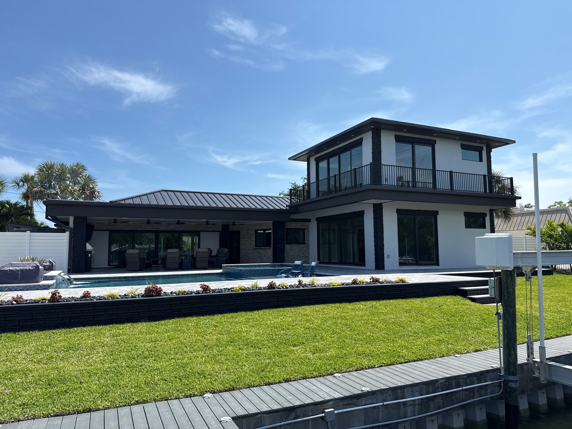7-Inch Smooth Box Seamless Gutters using black seamless gutters in Siesta Key Fl by Gutter Professors