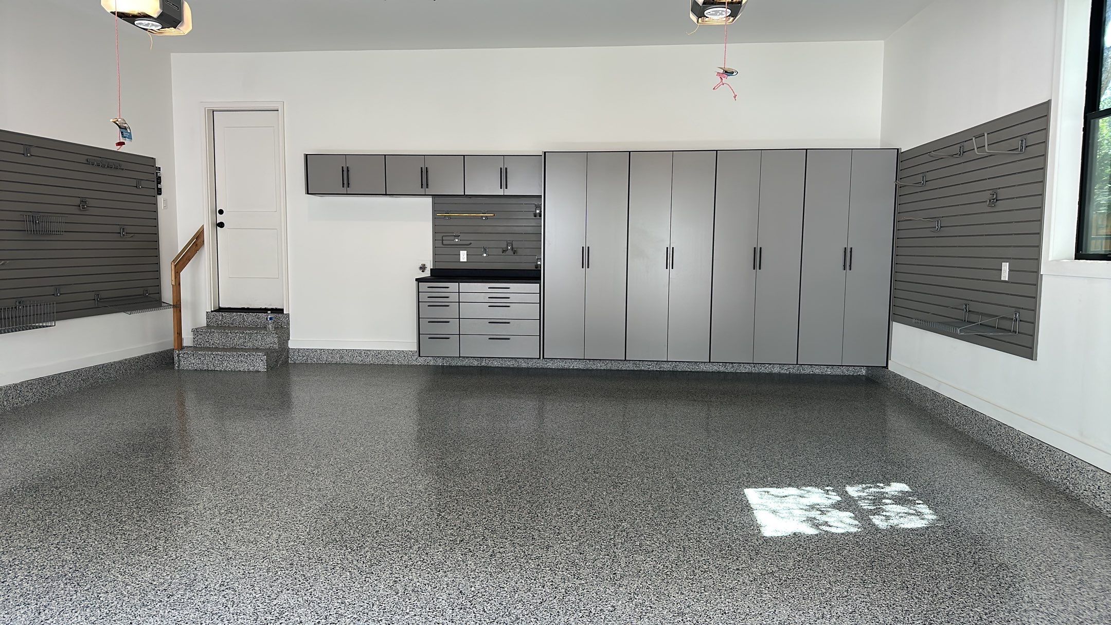Jeanne E. transformed her garage with cabinets and a Banner Garage Floor by Banner Garage