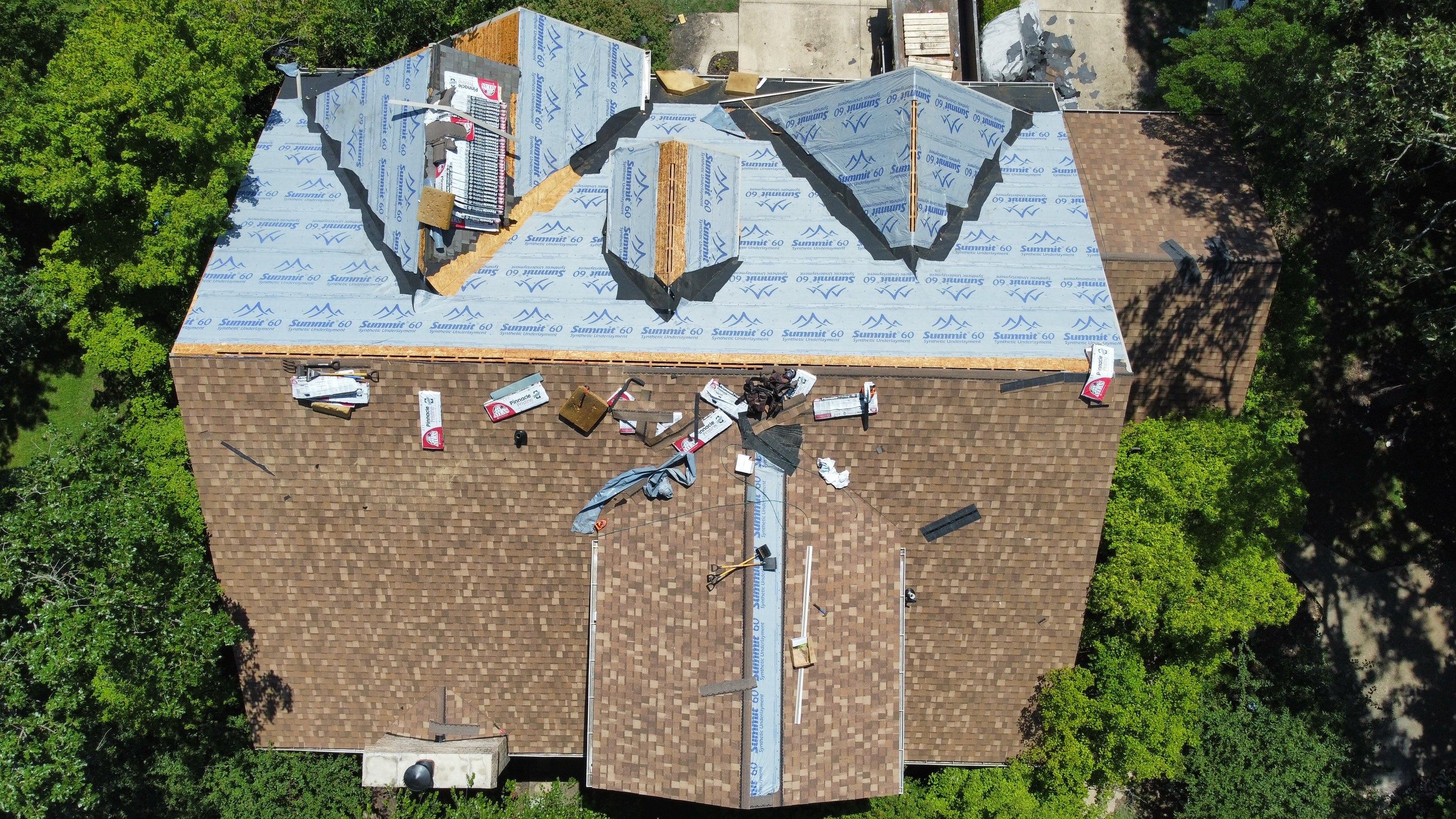 Residential Roof + Gutters & Downspouts & Gutter Guards  by Titan Commercial & Residential Roofing 