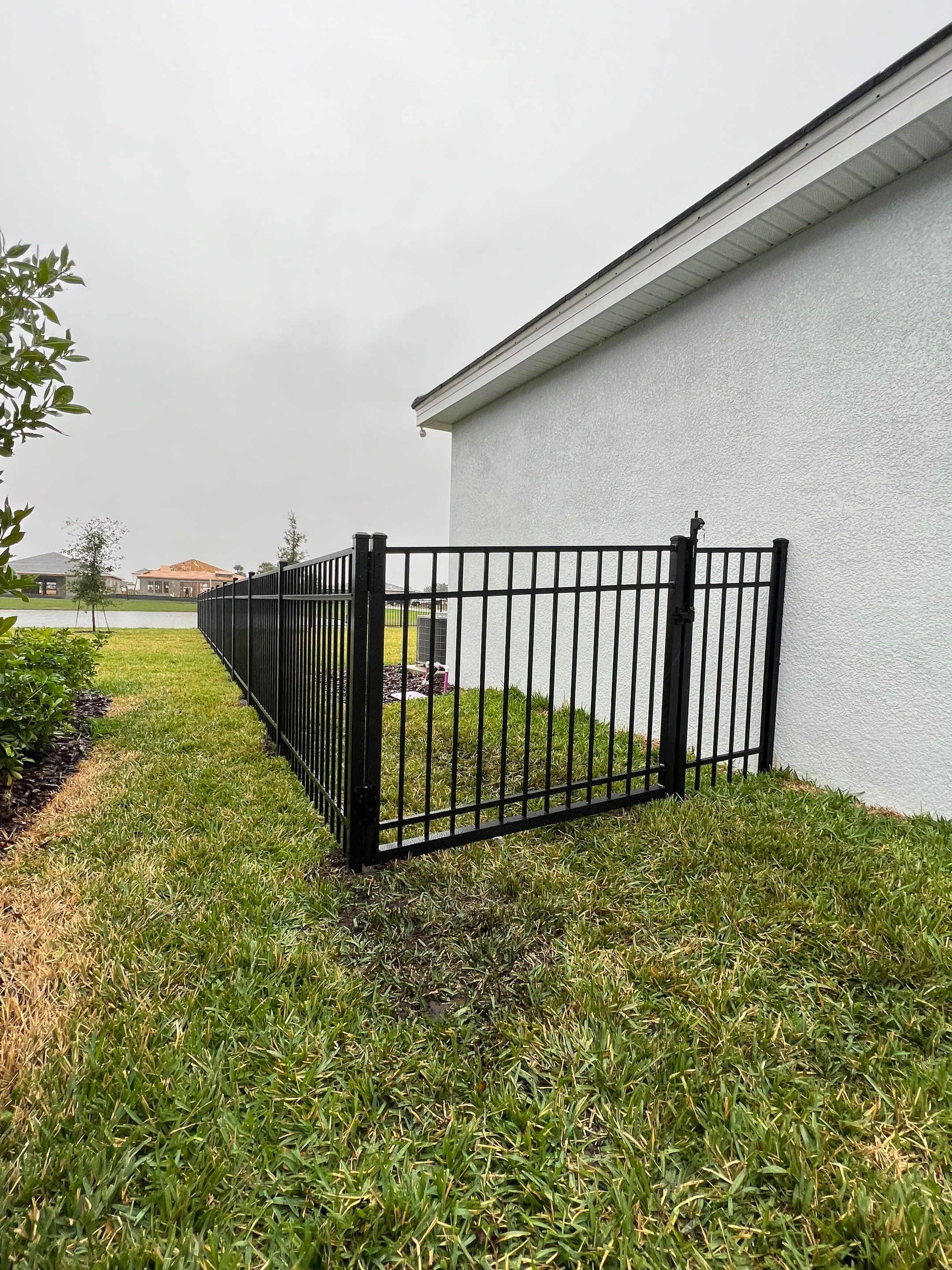 Aluminum Fence Installation using Black 3 Rail Aluminum Fence by Asap fence and gates, LLC