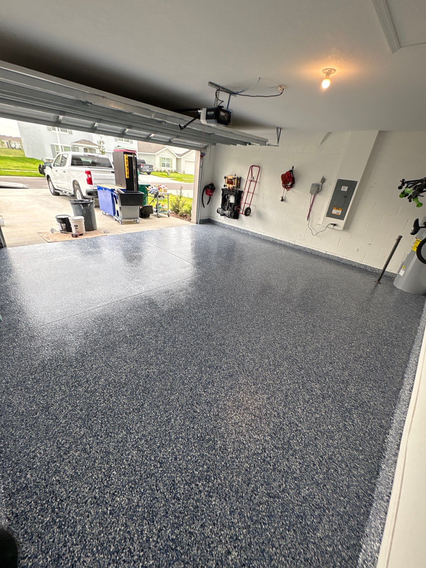 Zephyrhills, FL Epoxy Garage and Patio Floor Upgrade by Performance Floors & Coating