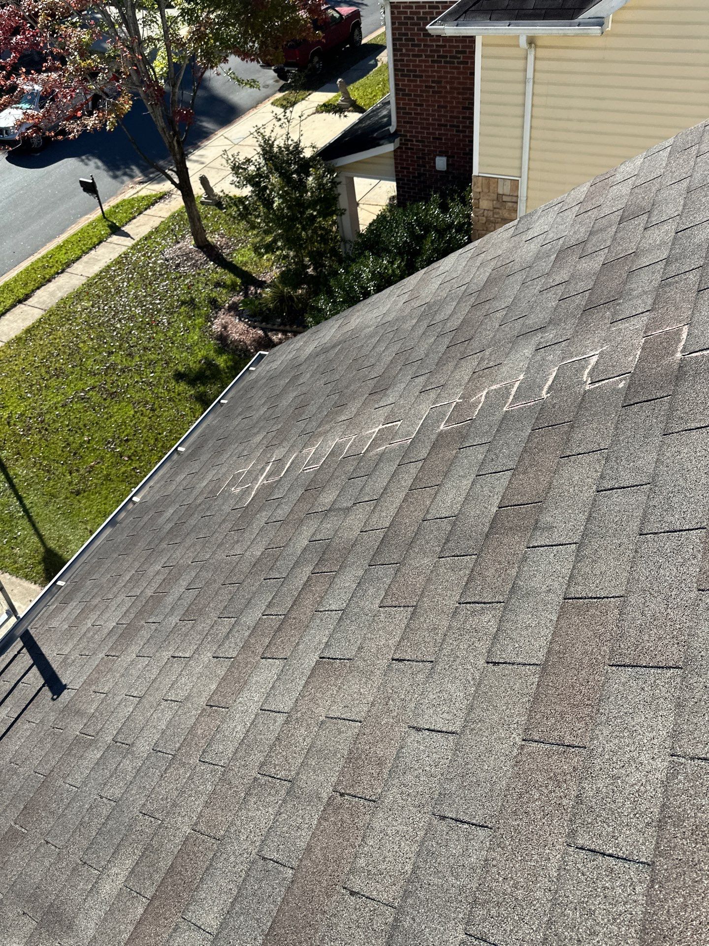 Roof replacement by wind damage by Just Brilliant Restoration JBR