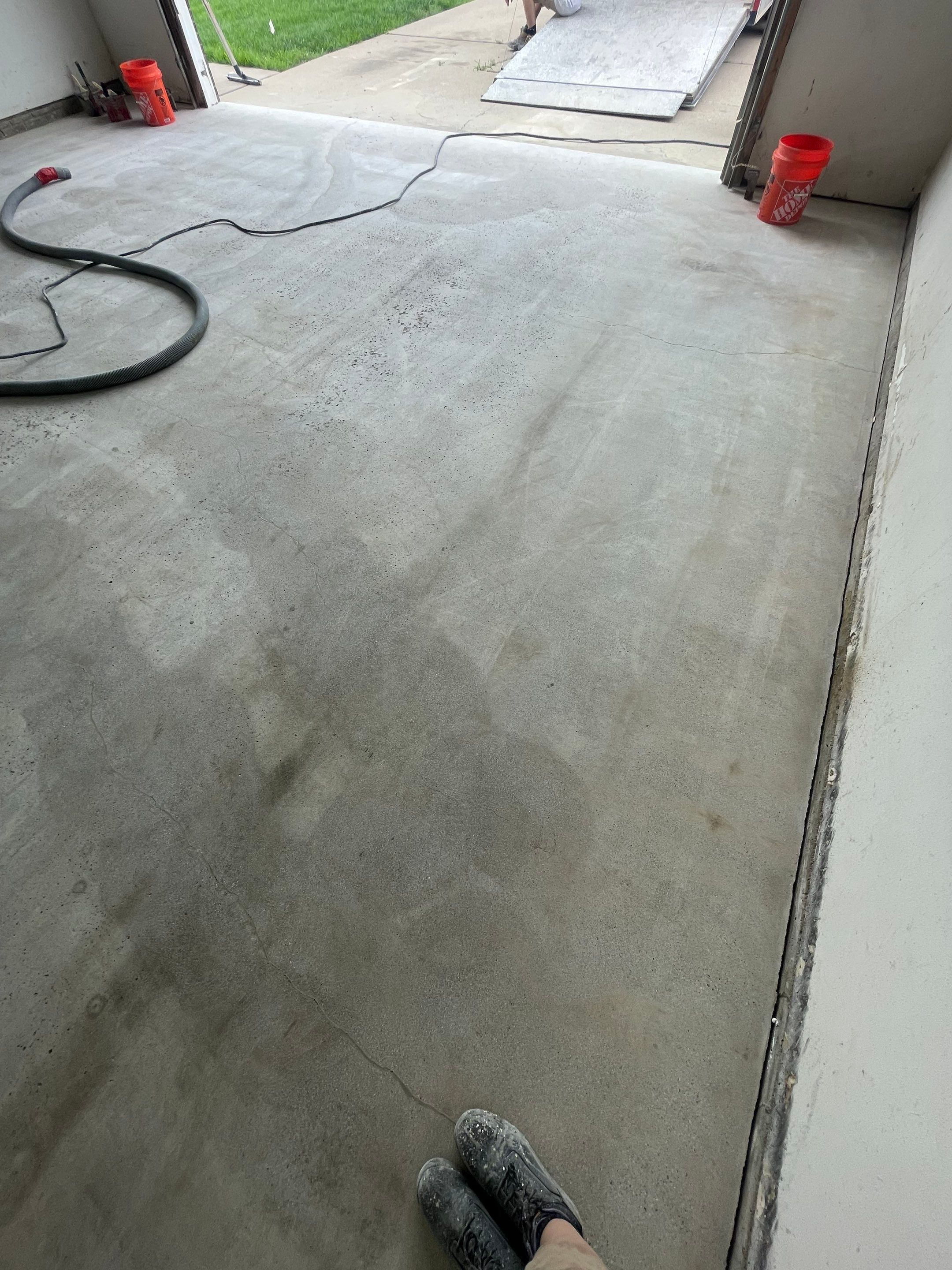 Coyote Flake Concrete Coating for Sioux Falls Garage by Select Painting, Coatings & Garage Cabinets