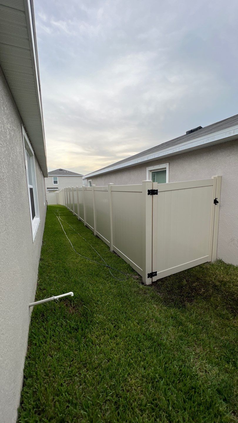 Tan Vinyl Privacy Fence Installation by Asap fence and gates, LLC