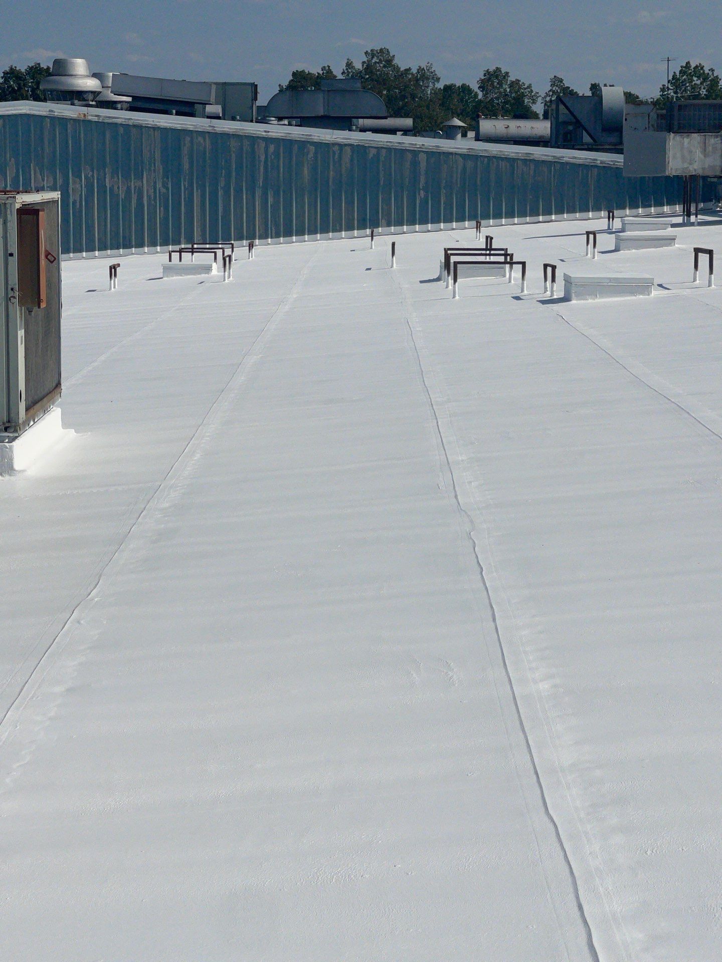Commercial Roofing Installation using Coatings by Kentucky Commercial Roofing