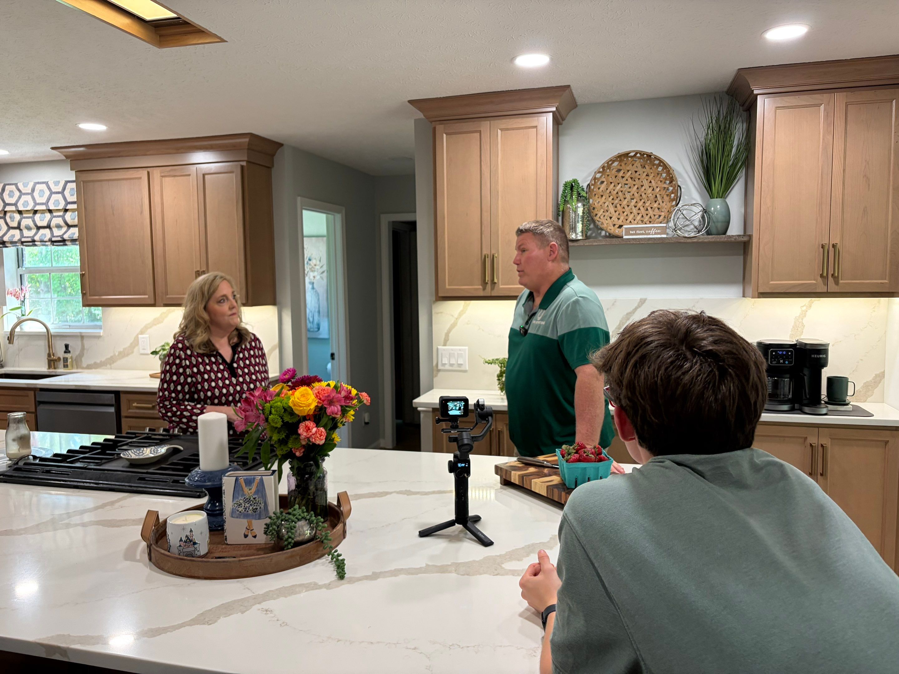 Modern Kitchen Remodel Featuring Quartz Backsplash, under cabinet lighintg, and a coffee bar in Mt. Juliet Tennessee by DeRo Renovations,LLC