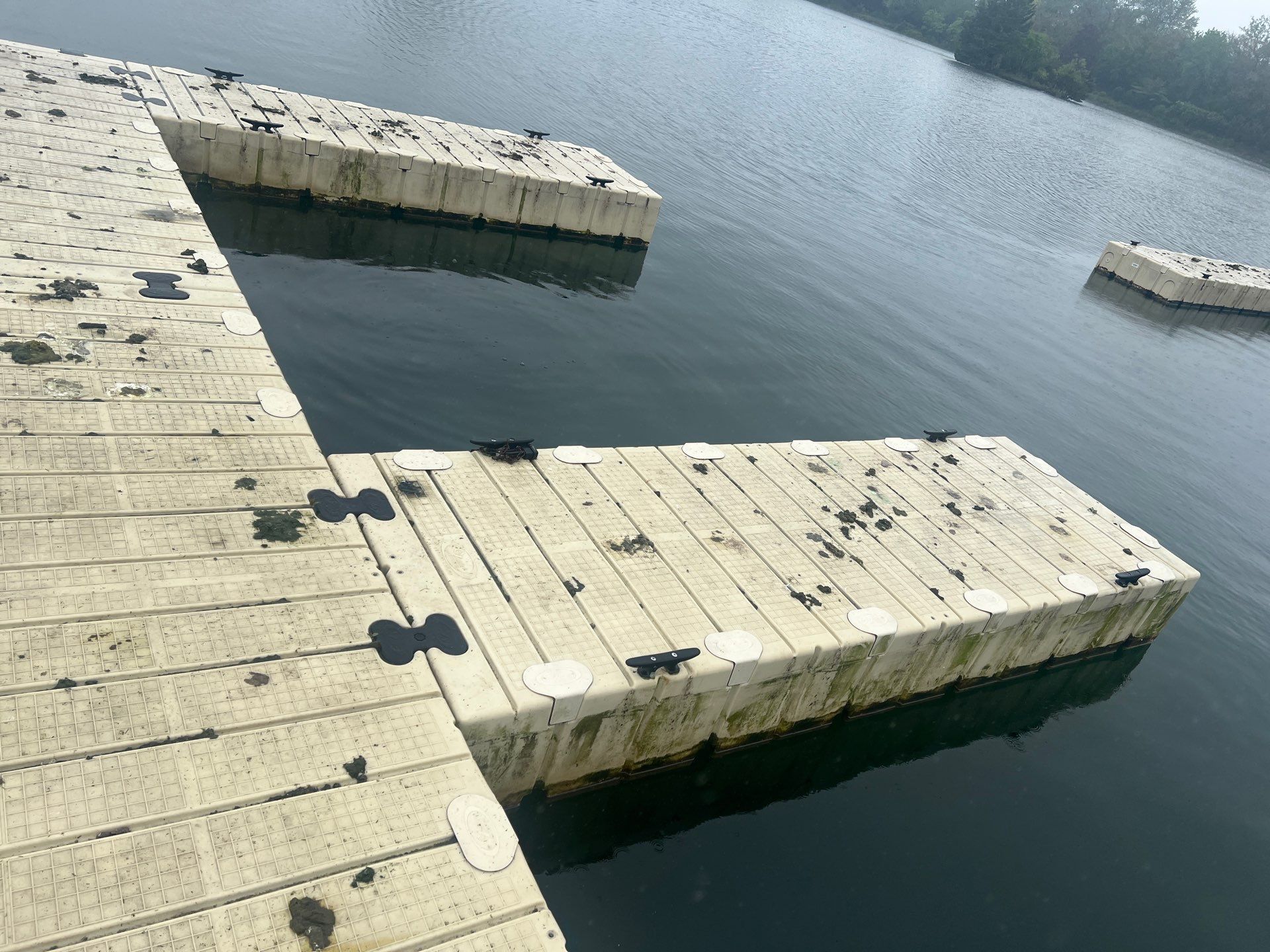 Power washing of floating dock by Northern Power Washing LLC.