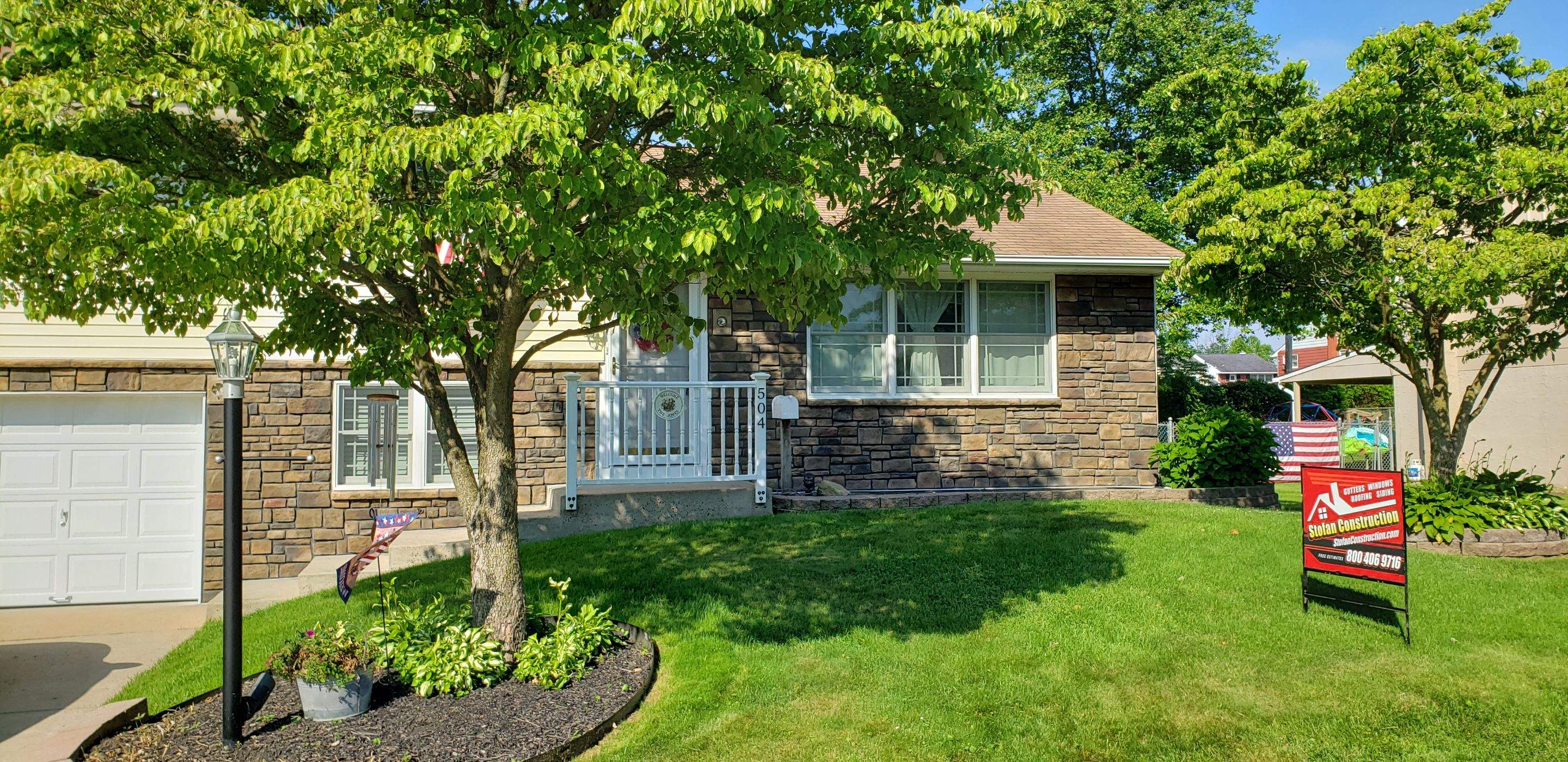 Decorative Stone Veneer and Siding Upgrade in Penndel by Stofan Construction LLC