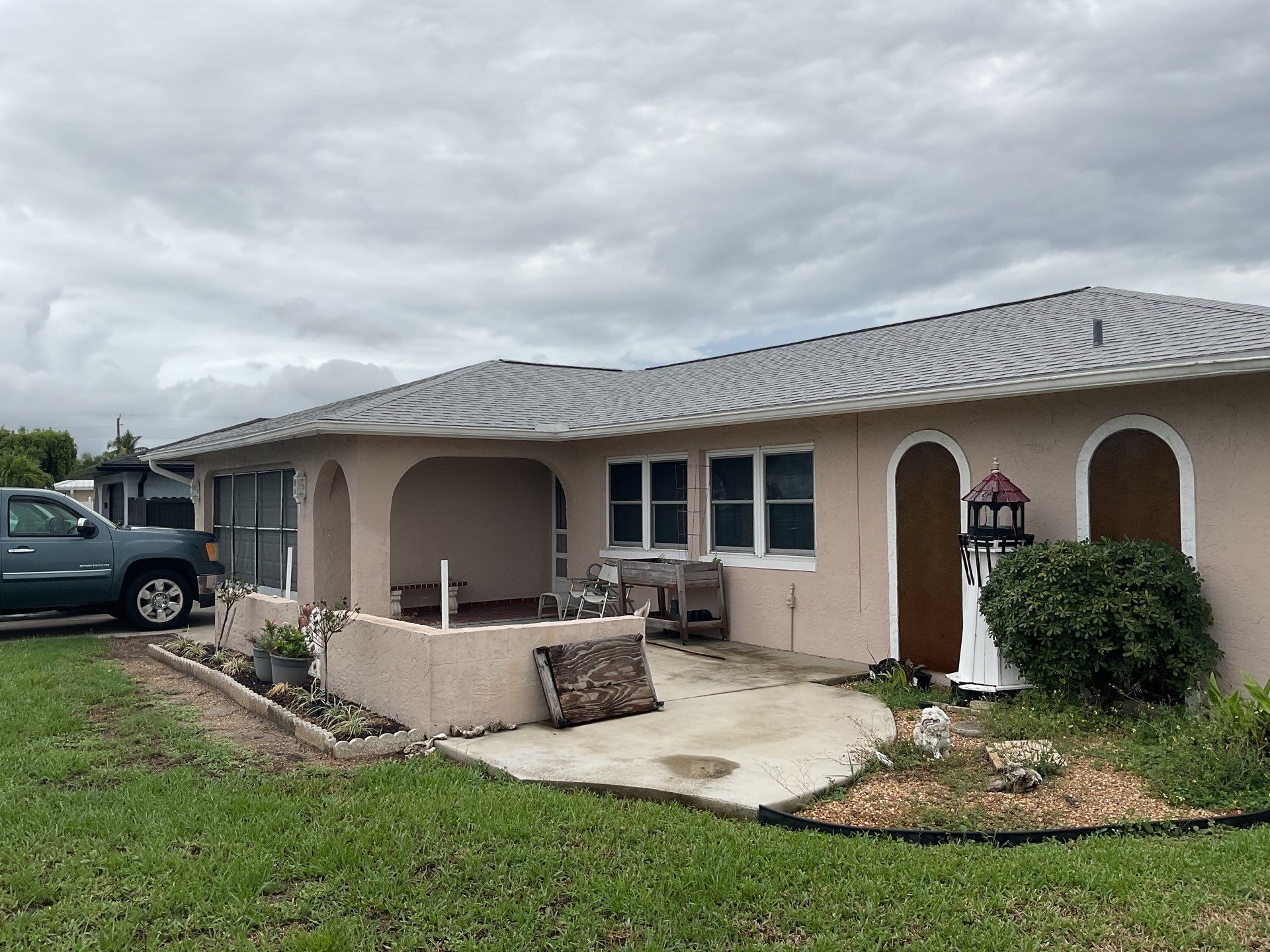 White Seamless Gutters and Splash Guards in Fort Myers FL by Gutter Professor by Gutter Professors