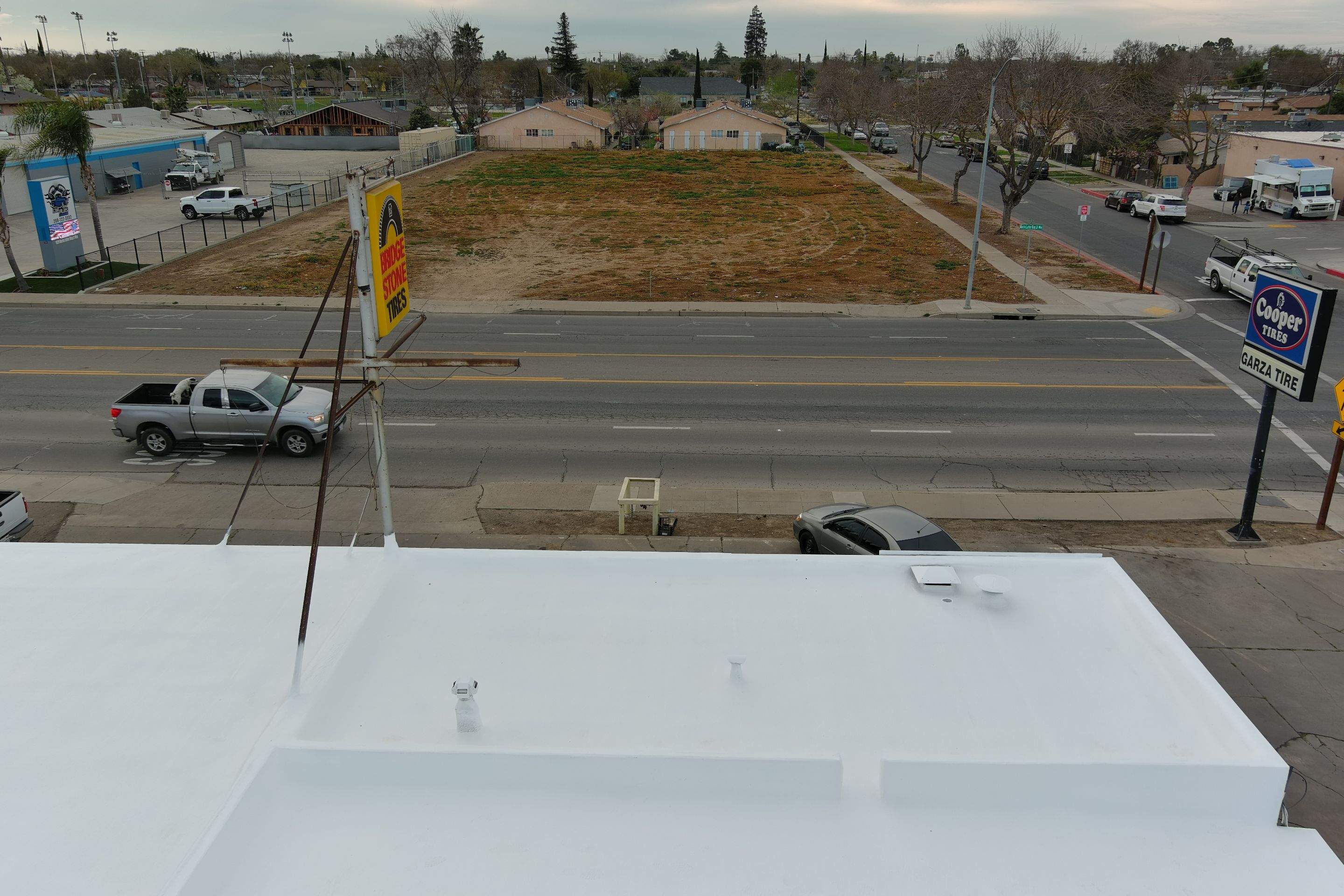 Spray foam and coatings using Conklin Benchmark/PUMA XL coatings and spray foam by Straight Edge Roofing Inc