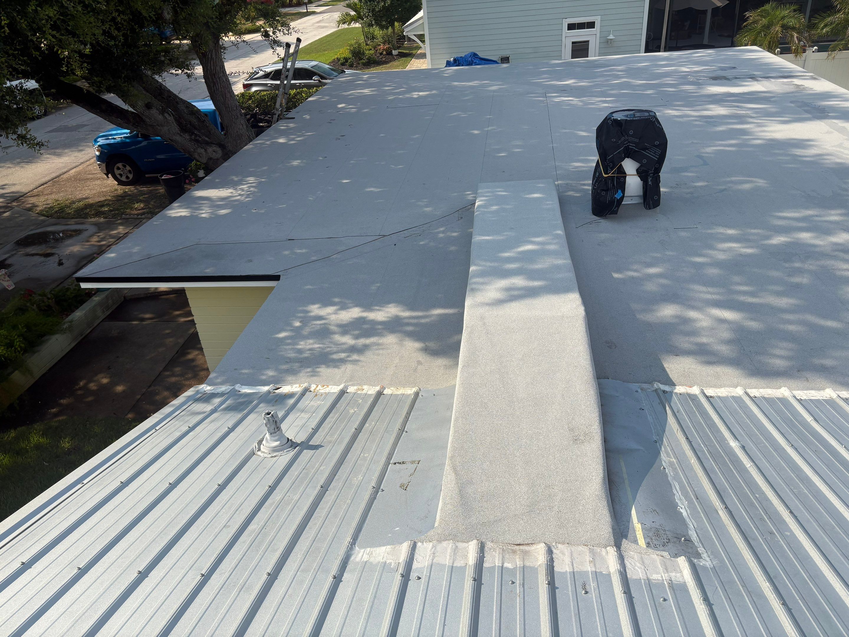 Flat Reroof Replacement New Smyrna Beach FL by Pinnacle Roofing Group