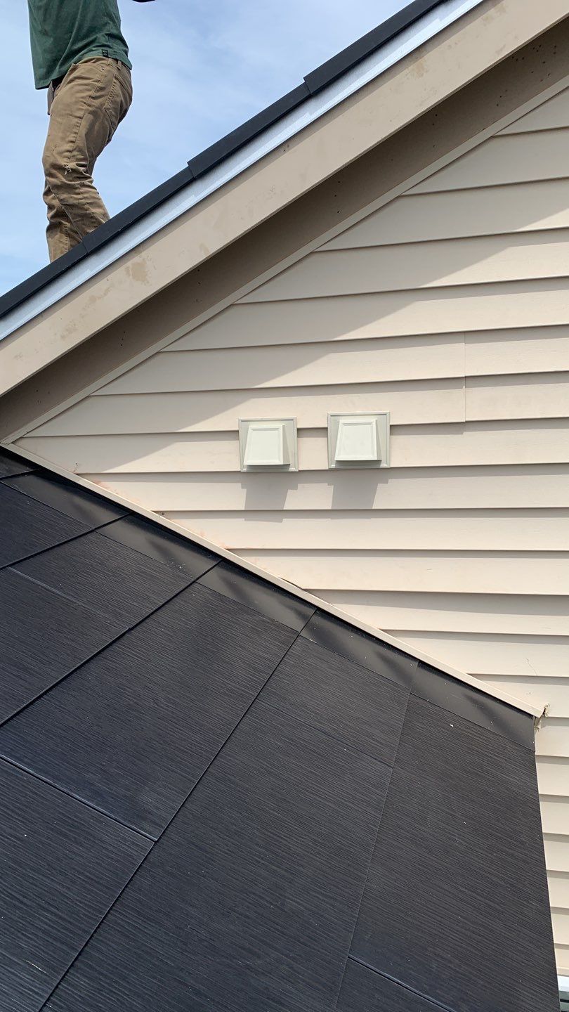Tesla Solar Roof using Tesla Solar Roof V3 tiles by American Home Contractors