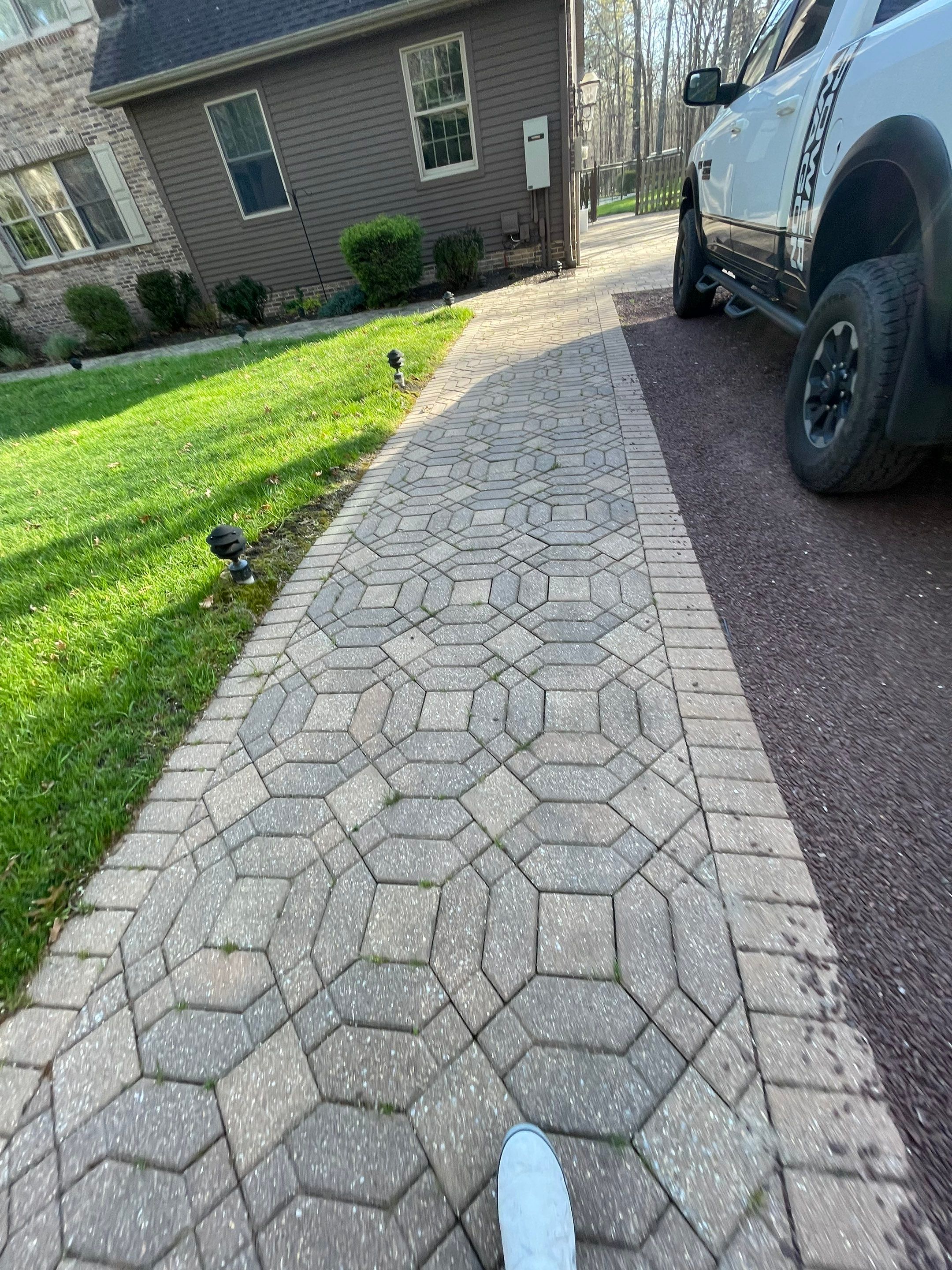 Pavers Cleaned, Garage and Concrete walls by SJ Exterior