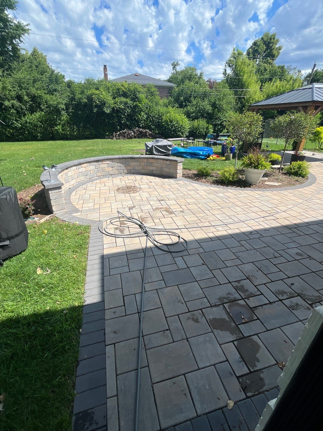 Brick paver repair, cleaning and sealing by Northern Power Washing LLC.