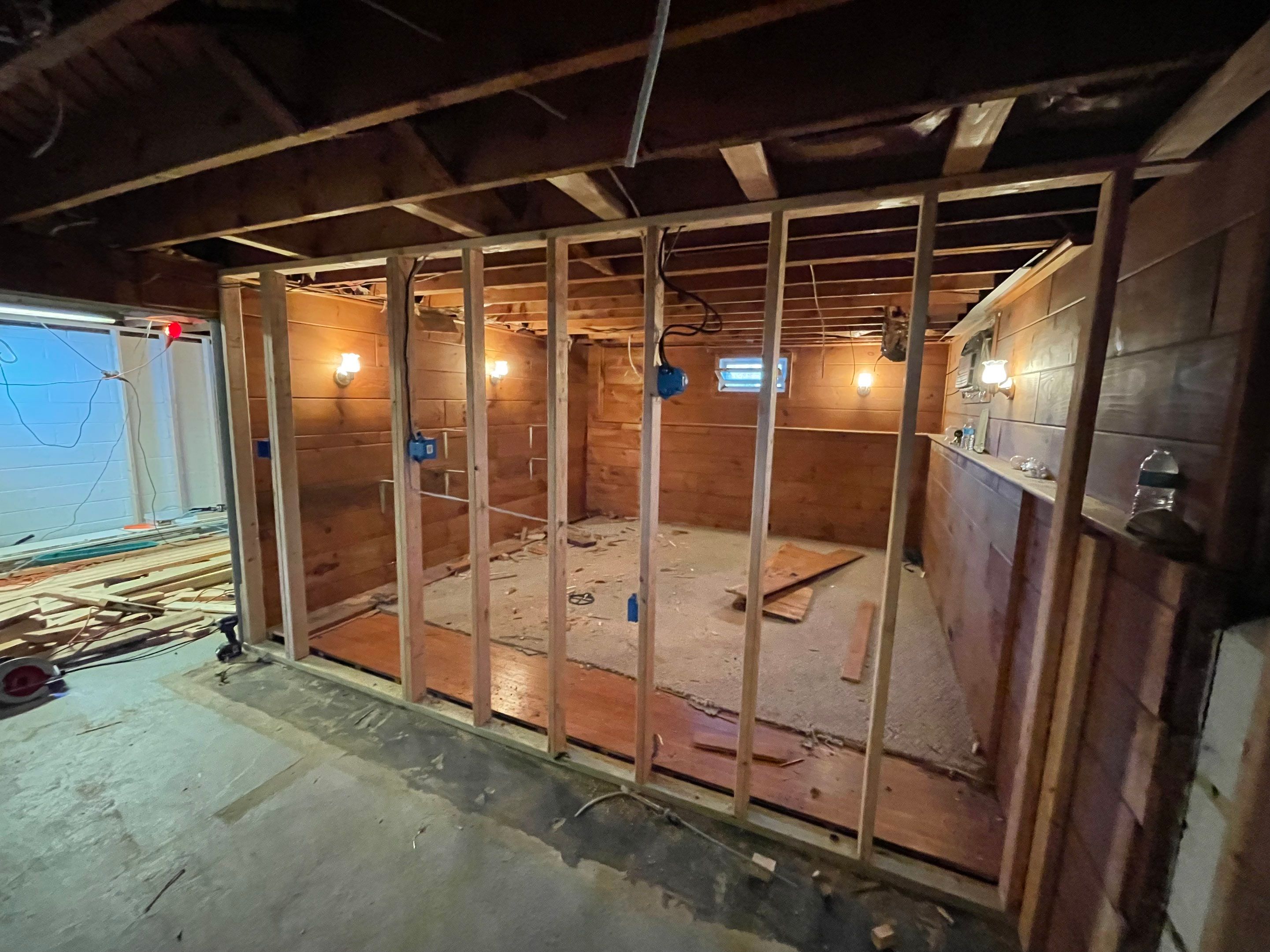 Basement Remodel using Wood by Home Concepts Construction