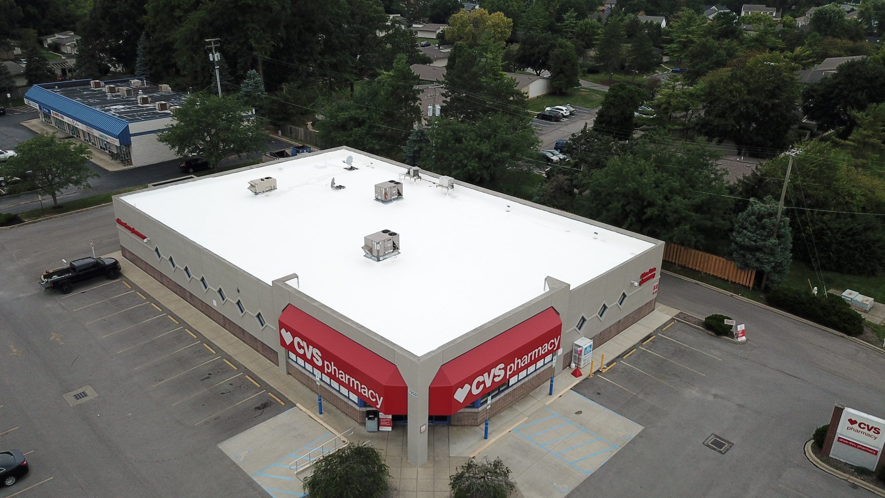 Fabric Reinforced Roof Coating by Gold Star Roofing LLC 
