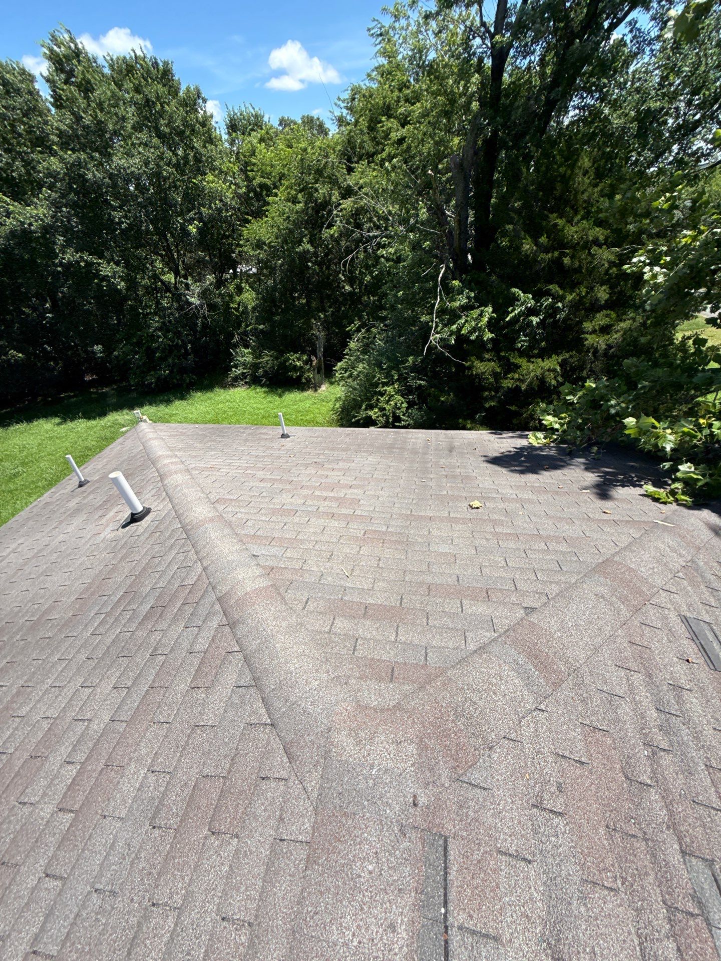 2 layers tear off & installation of new architectural shingles. by In & Out Construction & Remodeling, LLC
