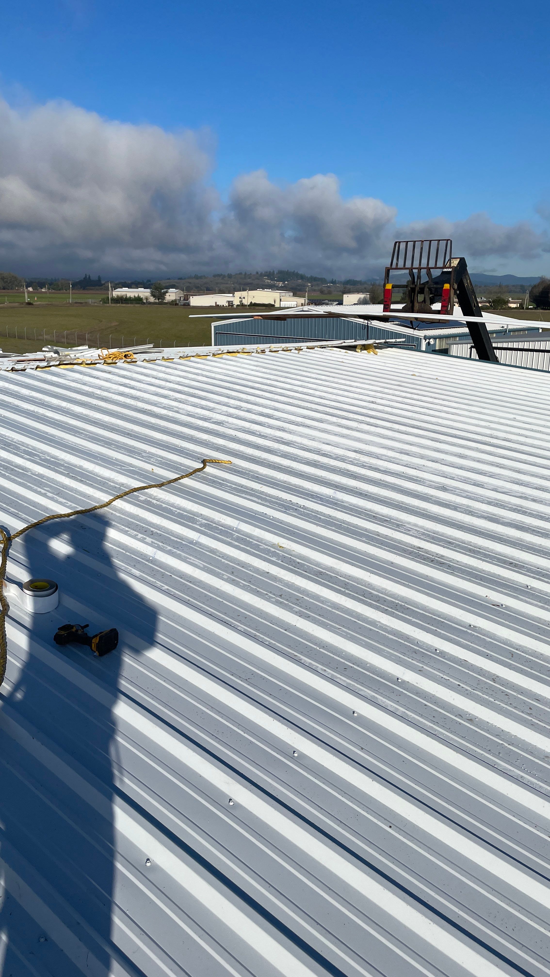 Airport Hanger Metal Roof Replacement and Insulation by Villegas Remodeling, LLC