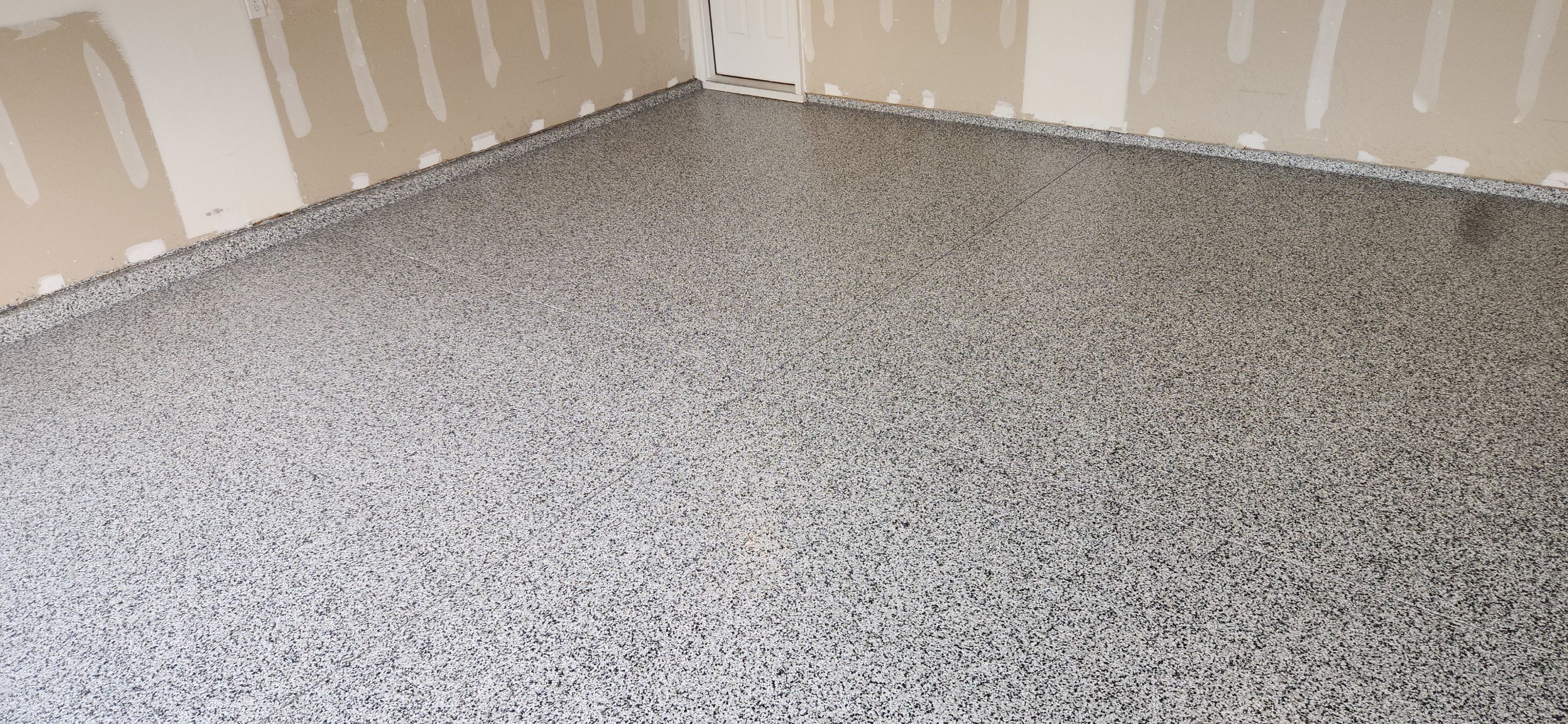 Garage & Back Patio using Domino & Pumice by Elite Floor Solutions