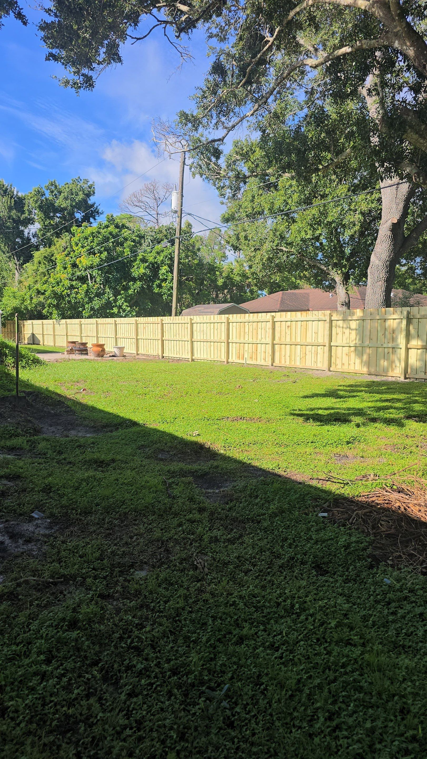 Pressure-Treated Wood Privacy Fence and Gate Installation in North Port by True Fence LLC