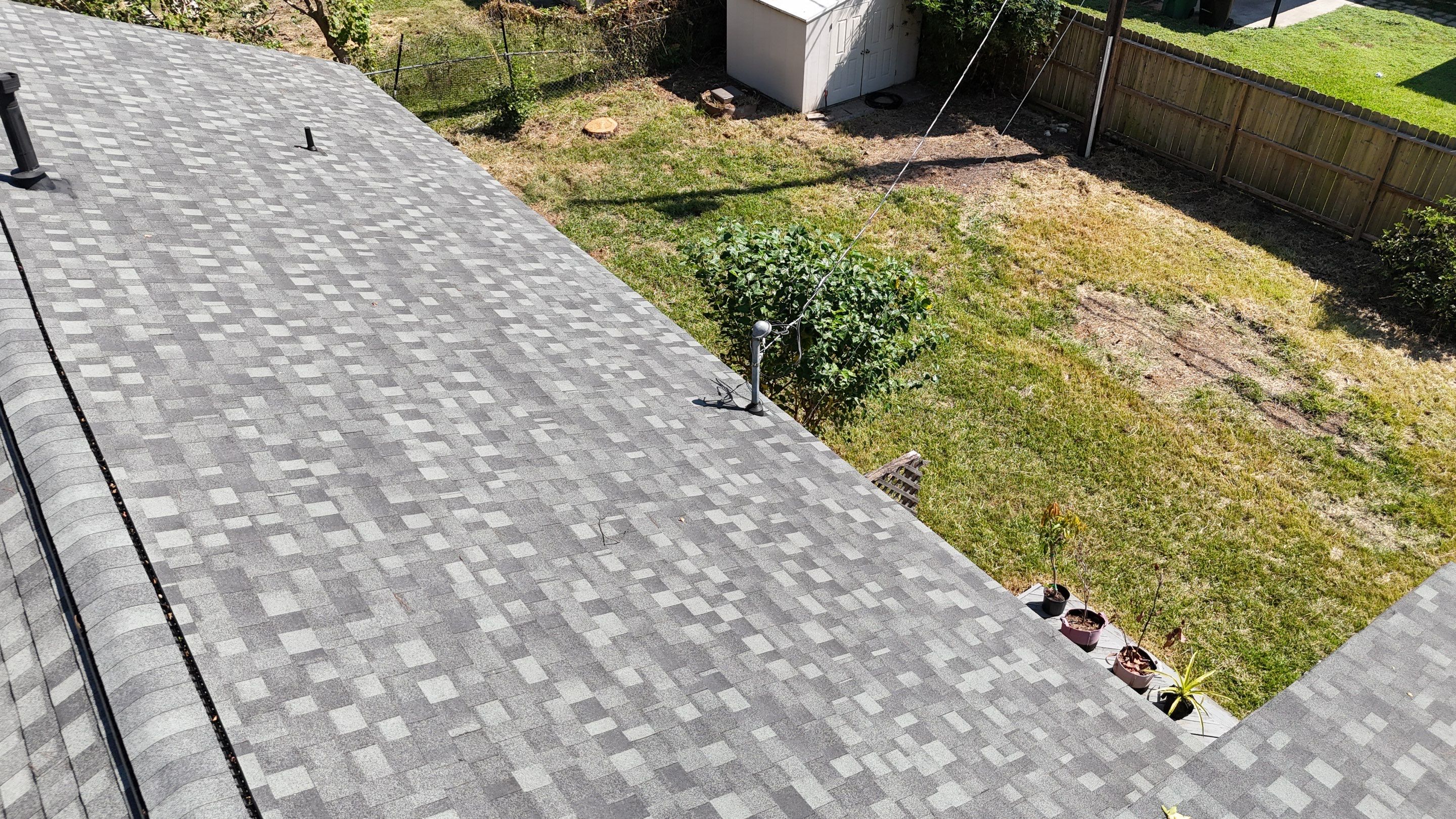 Roof Replacement after a 90-foot tree fell on it! by Core Four Roofing