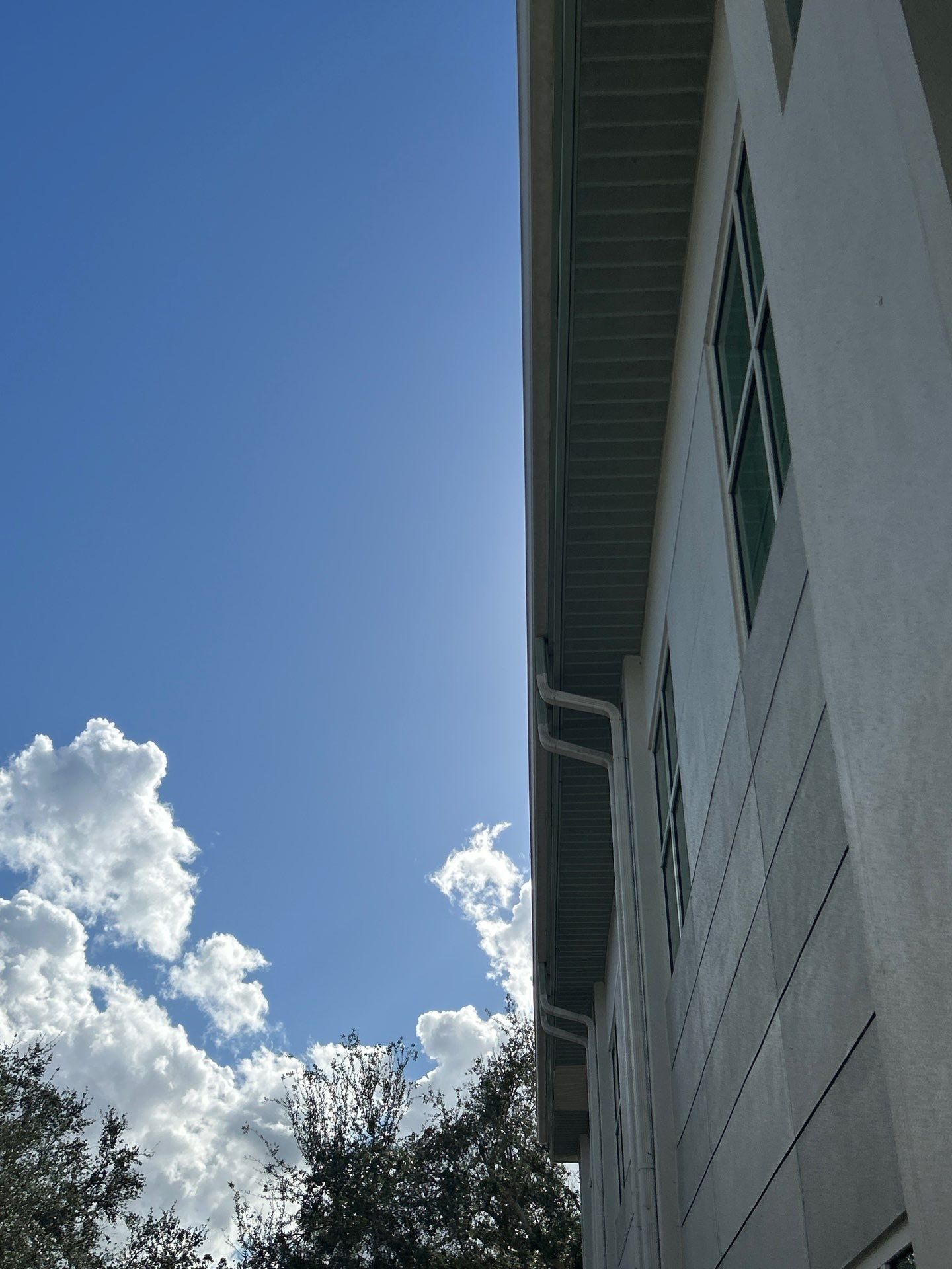 6-Inch White Seamless Gutters in Sarasota FL by Gutter Professors