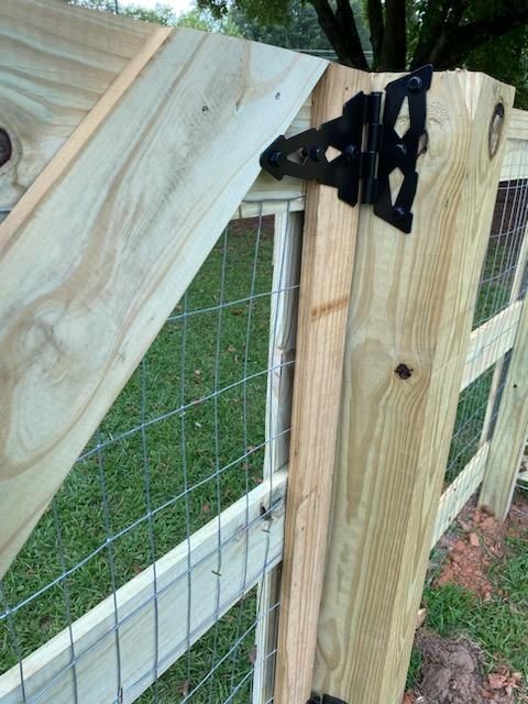 Fence Installation of 3 Rail Ranch with Wire Backing by Titans of Timber Fence & Stain