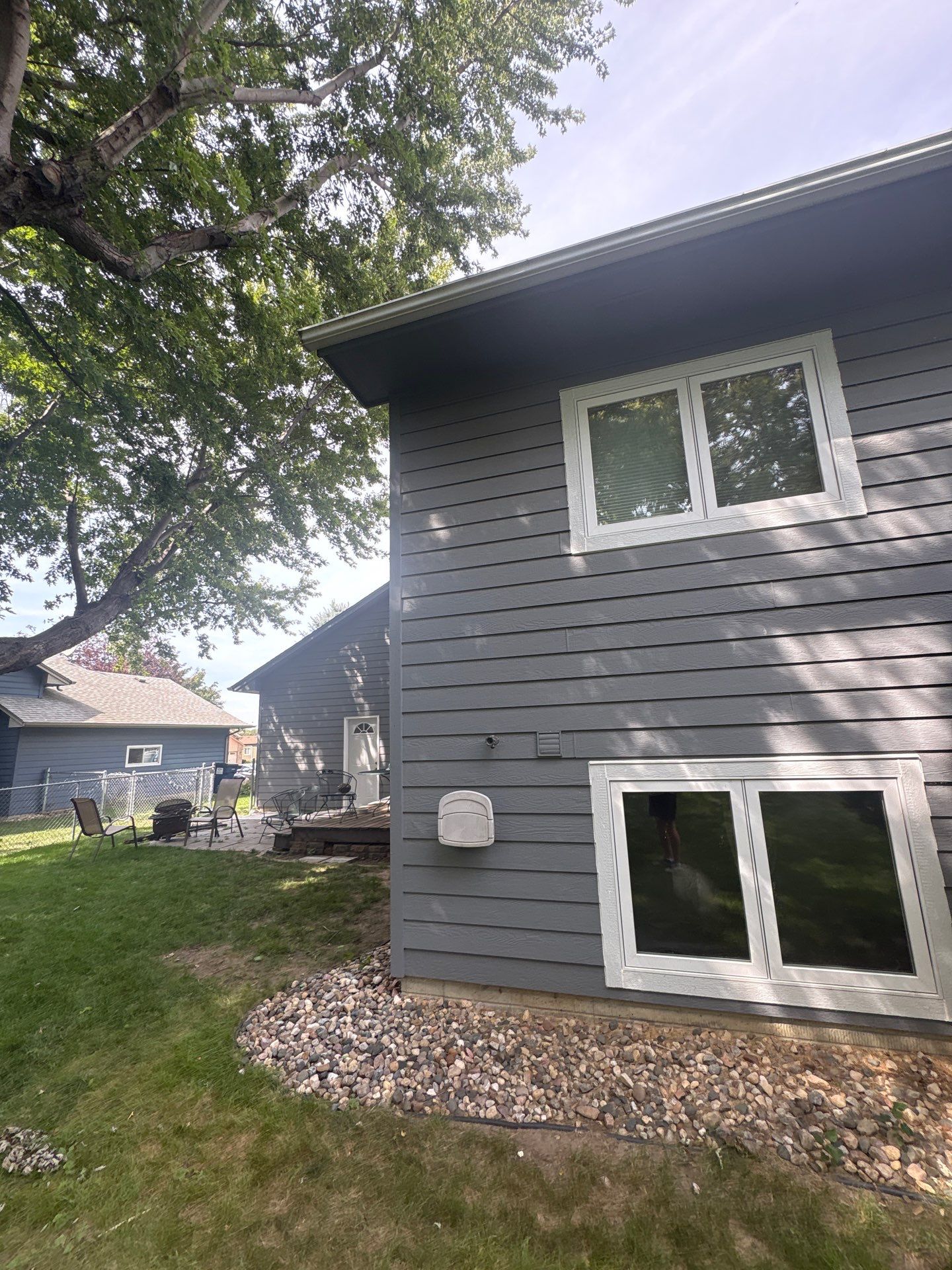 Full Exterior Painting for Gray Siding and Trim in Sioux Falls by Select Painting, Coatings & Garage Cabinets
