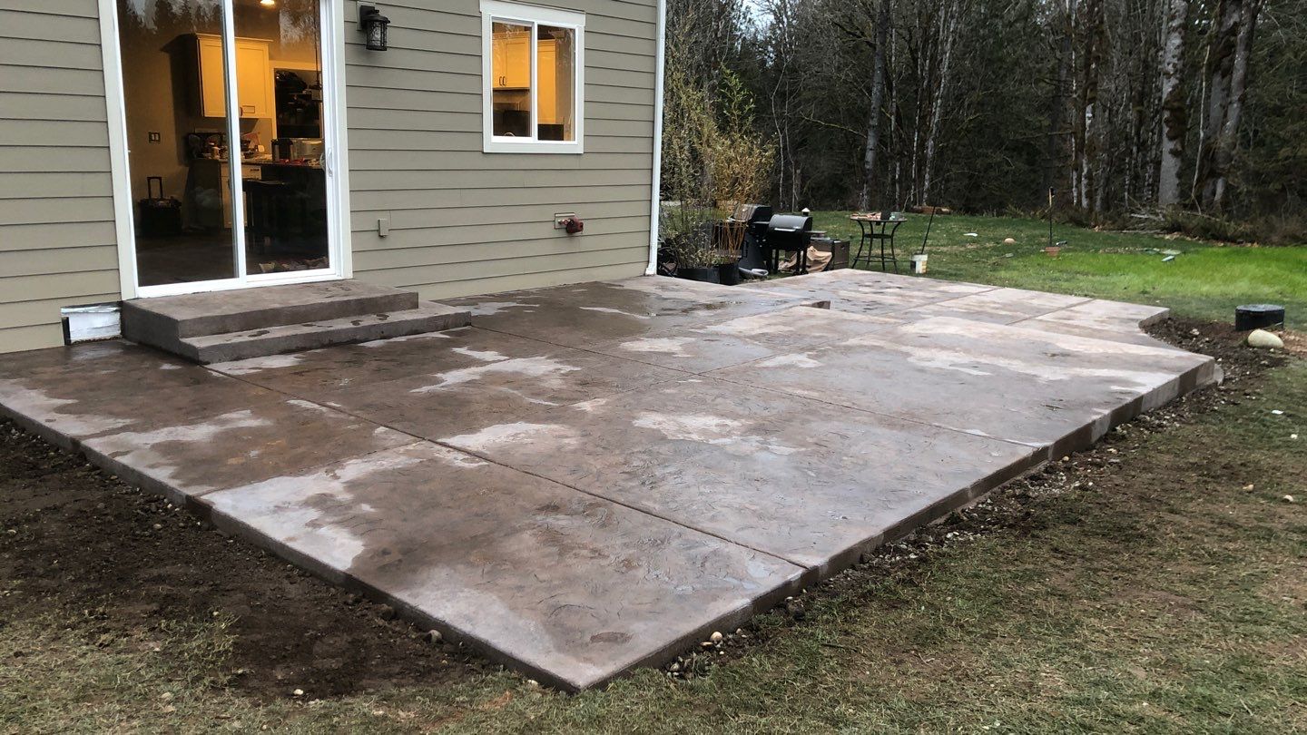 Mandy | Stamped Concrete Patio & Driveway by Jireh Asphalt & Concrete Inc 