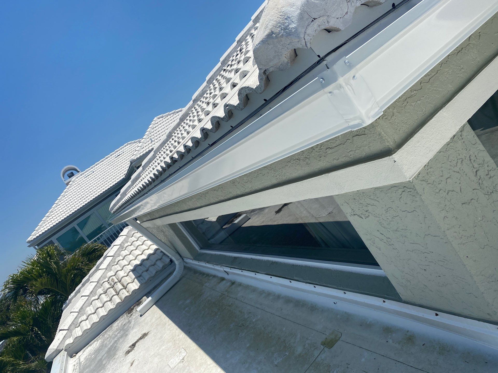 Splash Guard Gutters for Coastal Homes in Longboat Key FL by Gutter Professors