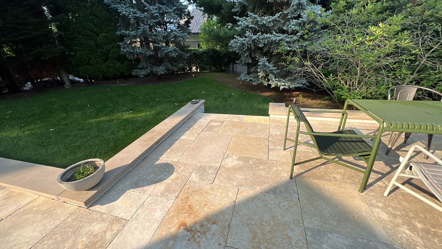 marble patio cleaning and sanding using Polysweep polymeric sand by Northern Power Washing LLC.