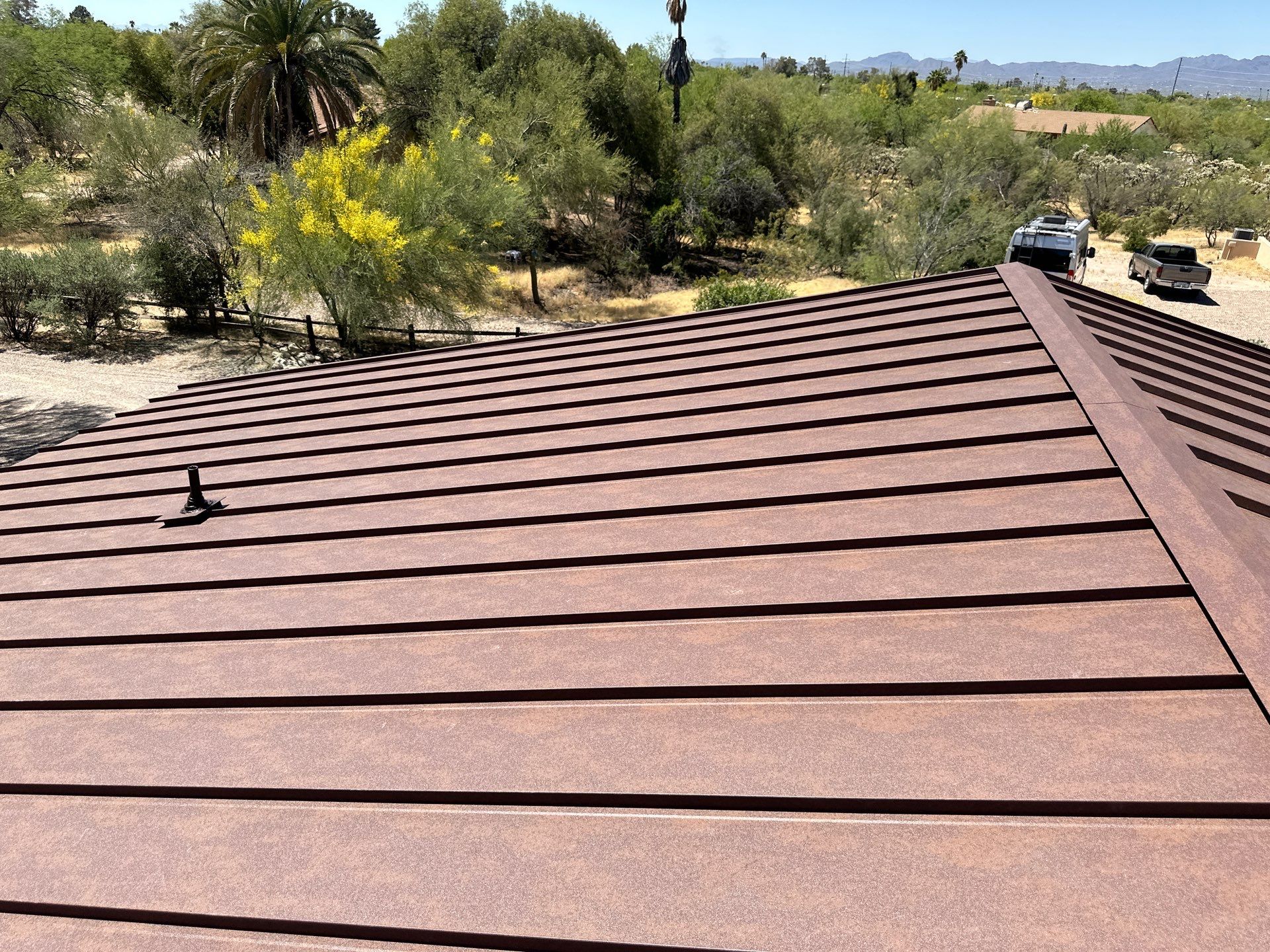 Weathered Rust Standing Seam by Reimagine Roofing
