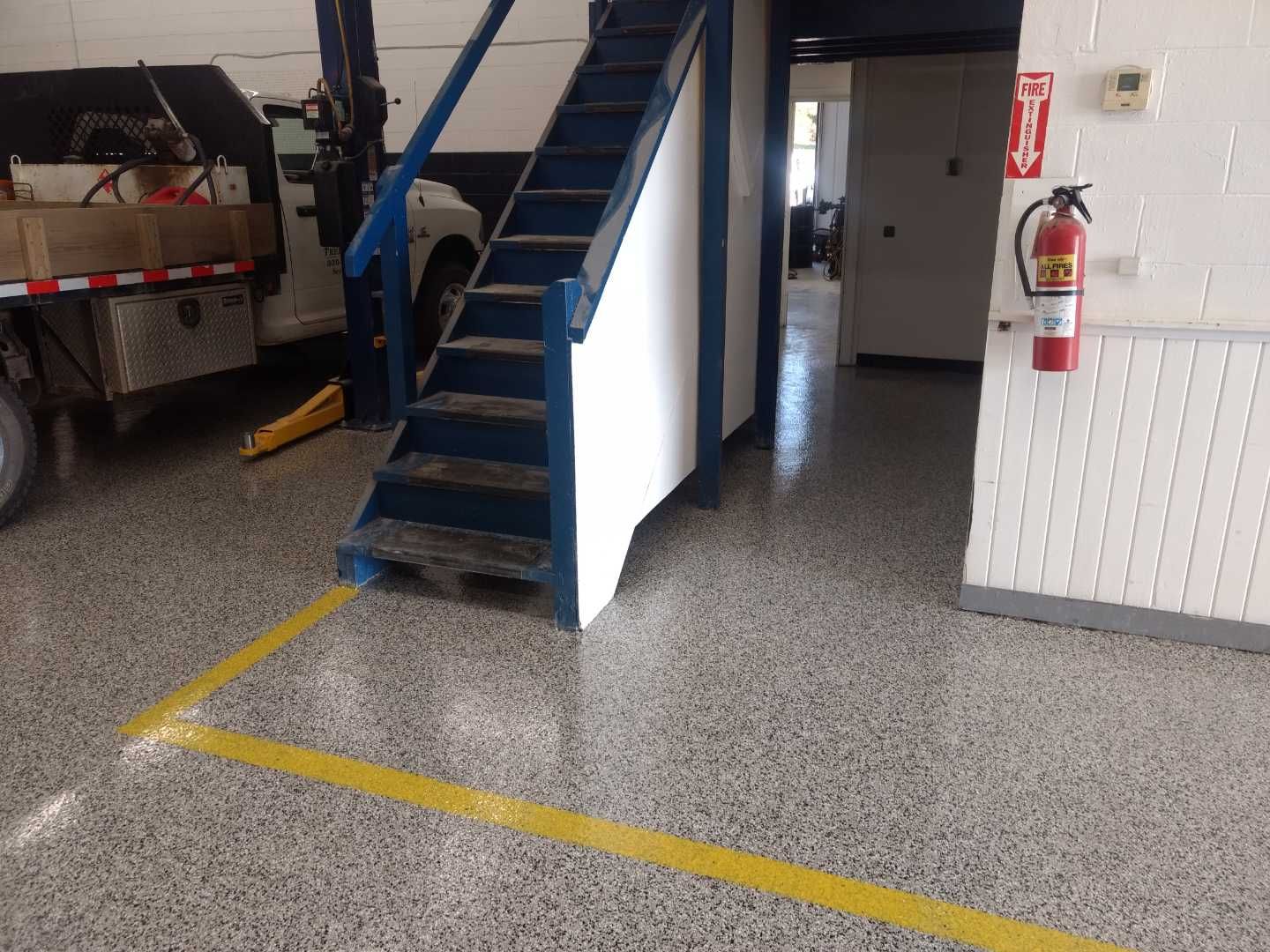 Commerical  using Domino by Fantastic Floors by Miller Custom Exteriors 