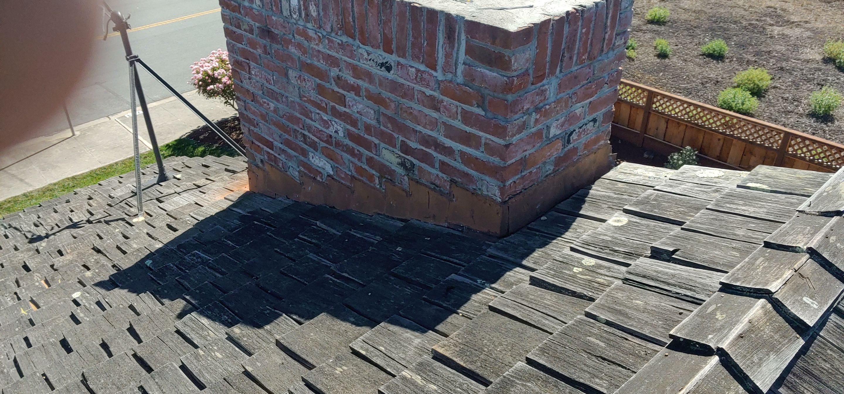 Refurbish and repair shake roof to get ready to sell by Straight Edge Roofing Inc