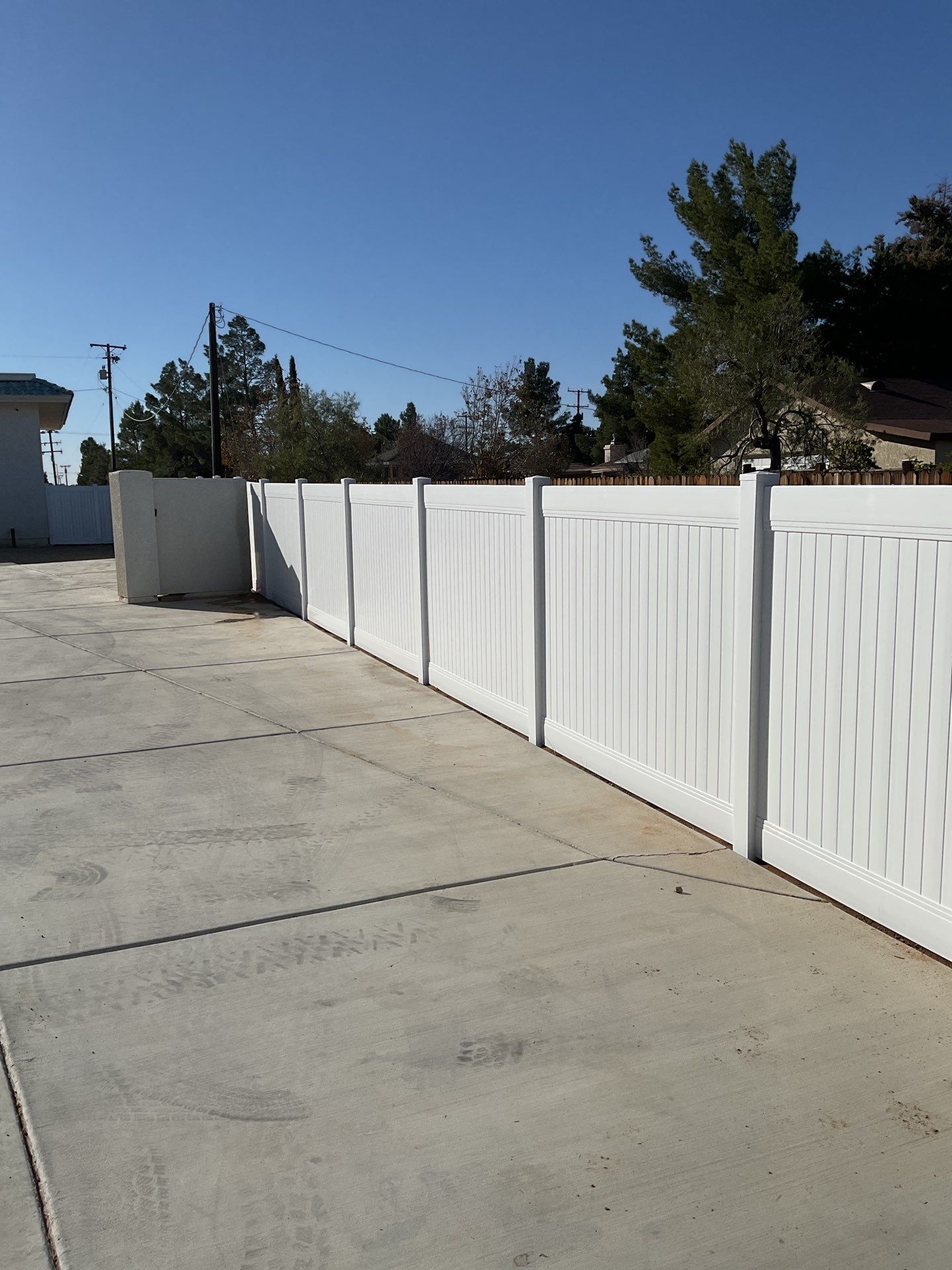 Fence Installation using Ranch Style Vinyl by Fence Guys Inc. 
