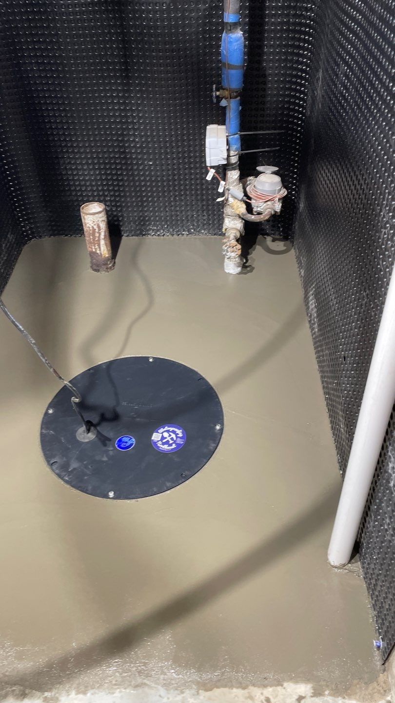 Interior Drain Tile & Sump Pump System in West Minneapolis by Waterproofing Northeast