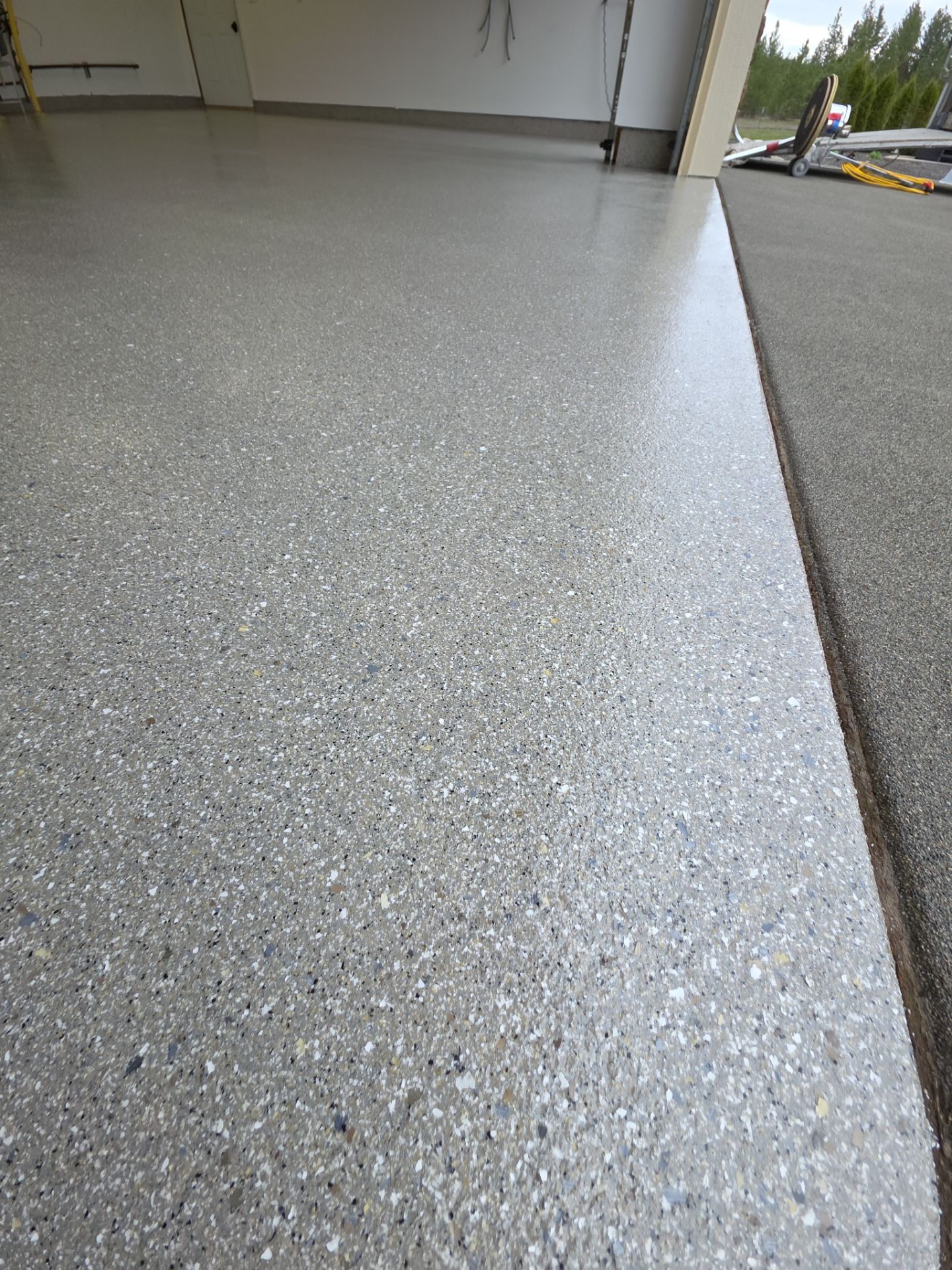 Travertine Hybrid Garage Floor Coating and Crack Repair in Spokane by Croc Coatings, LLC