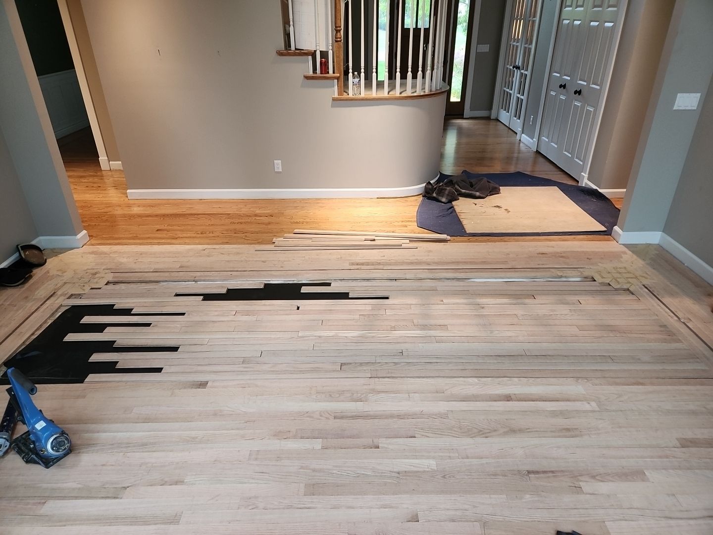 Ann Arbor Elegance: Red Oak and Walnut Living Room Masterpiece by Ann Arbor Hardwoods