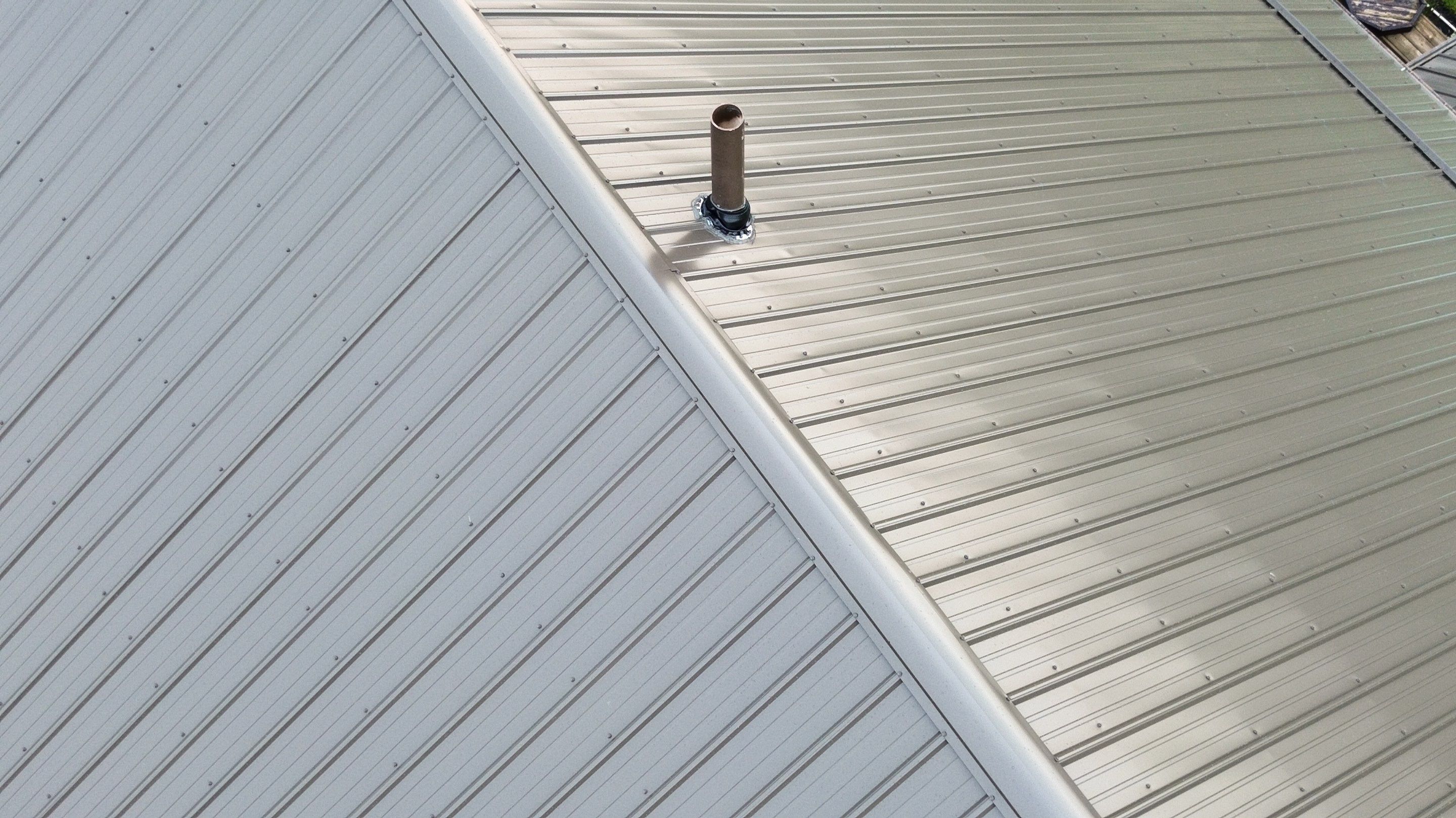 Residential Roofing Installation using Performance Panel Metal - Burnished Slate by RoofX 