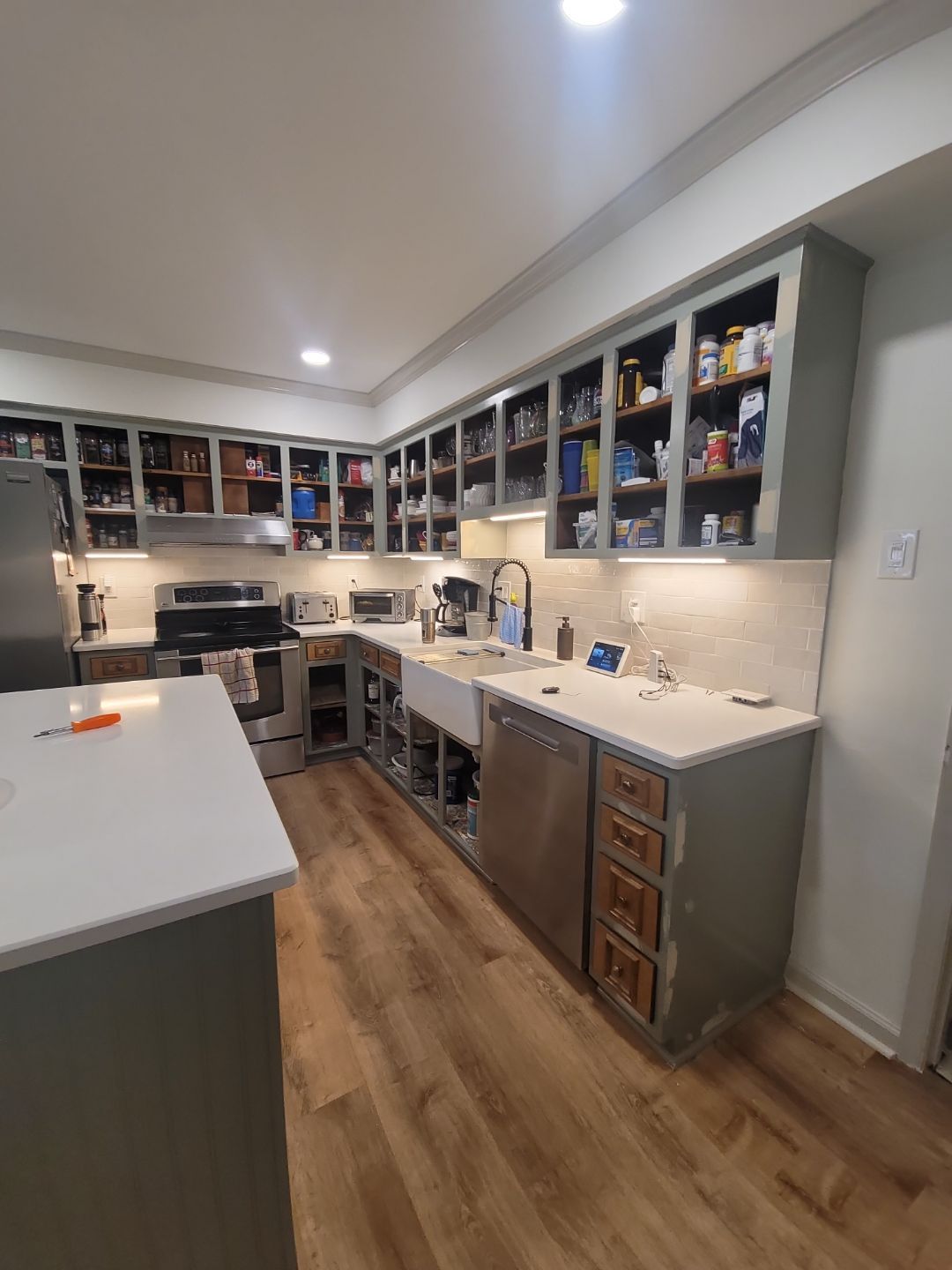 A Pathway to Personality – A Two-Tone Kitchen Transformation in Apex by Elite Remodeling and Design LLC
