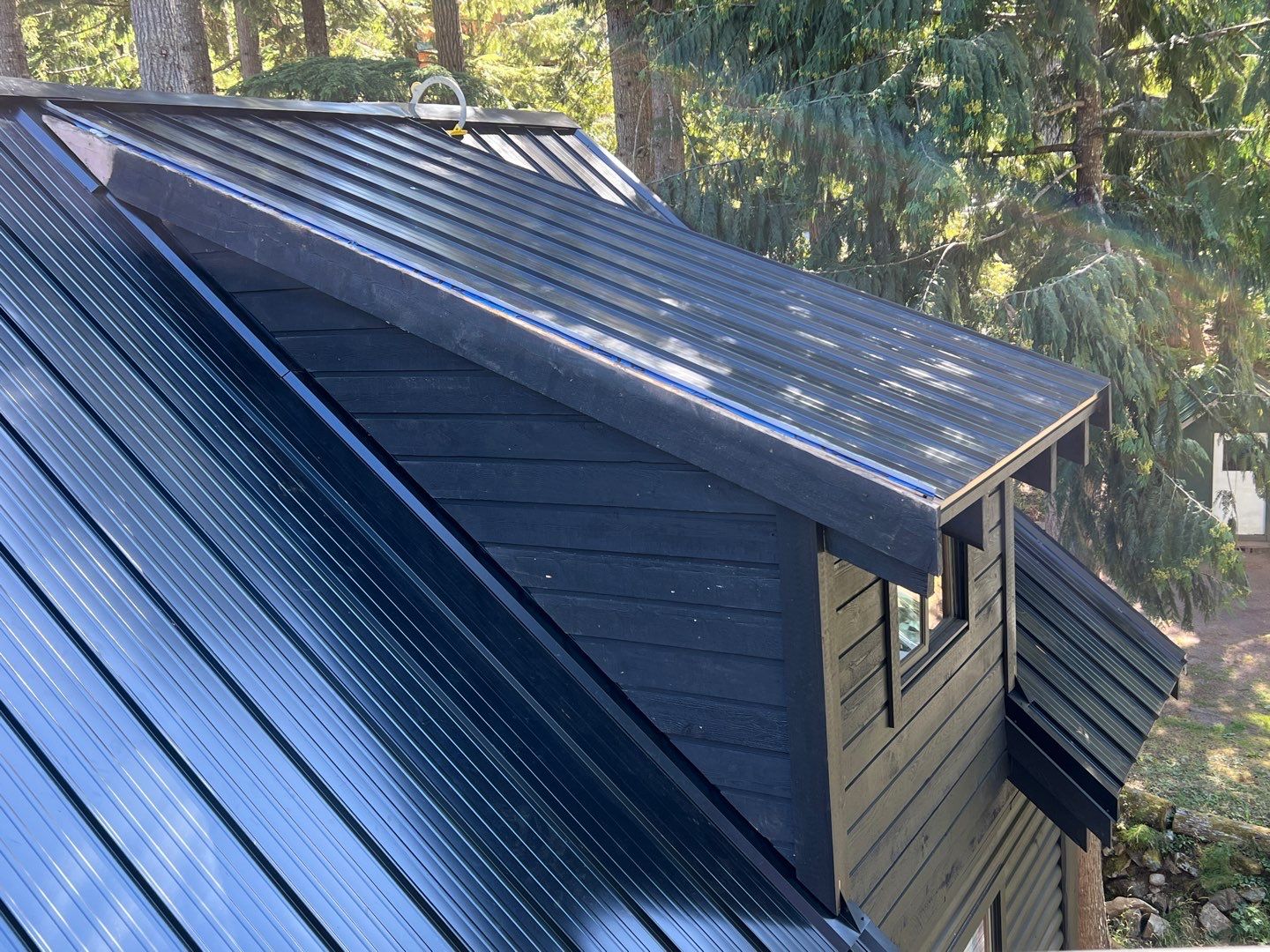 Residential ReRoofing Installation using 12" Prolok metal  by Top Notch Roofing Inc