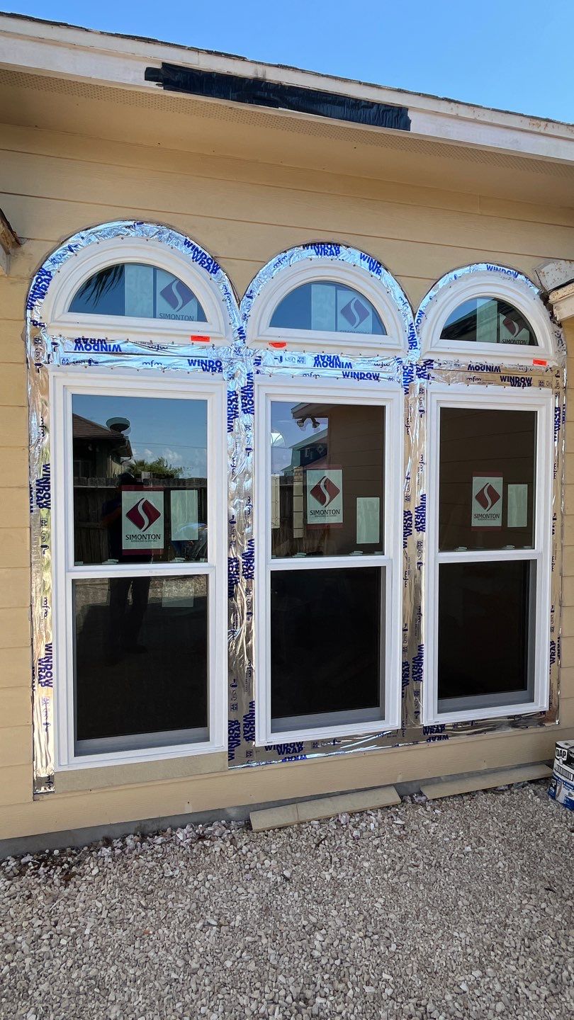 Curved Trim Windows by Bayfront Roofing and Construction