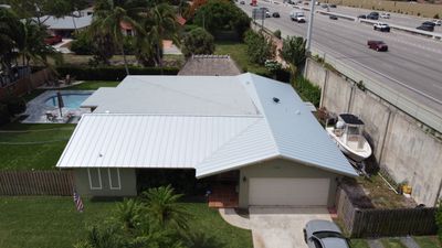 Residential Roofing Installation using 1" Nail strip metal roof