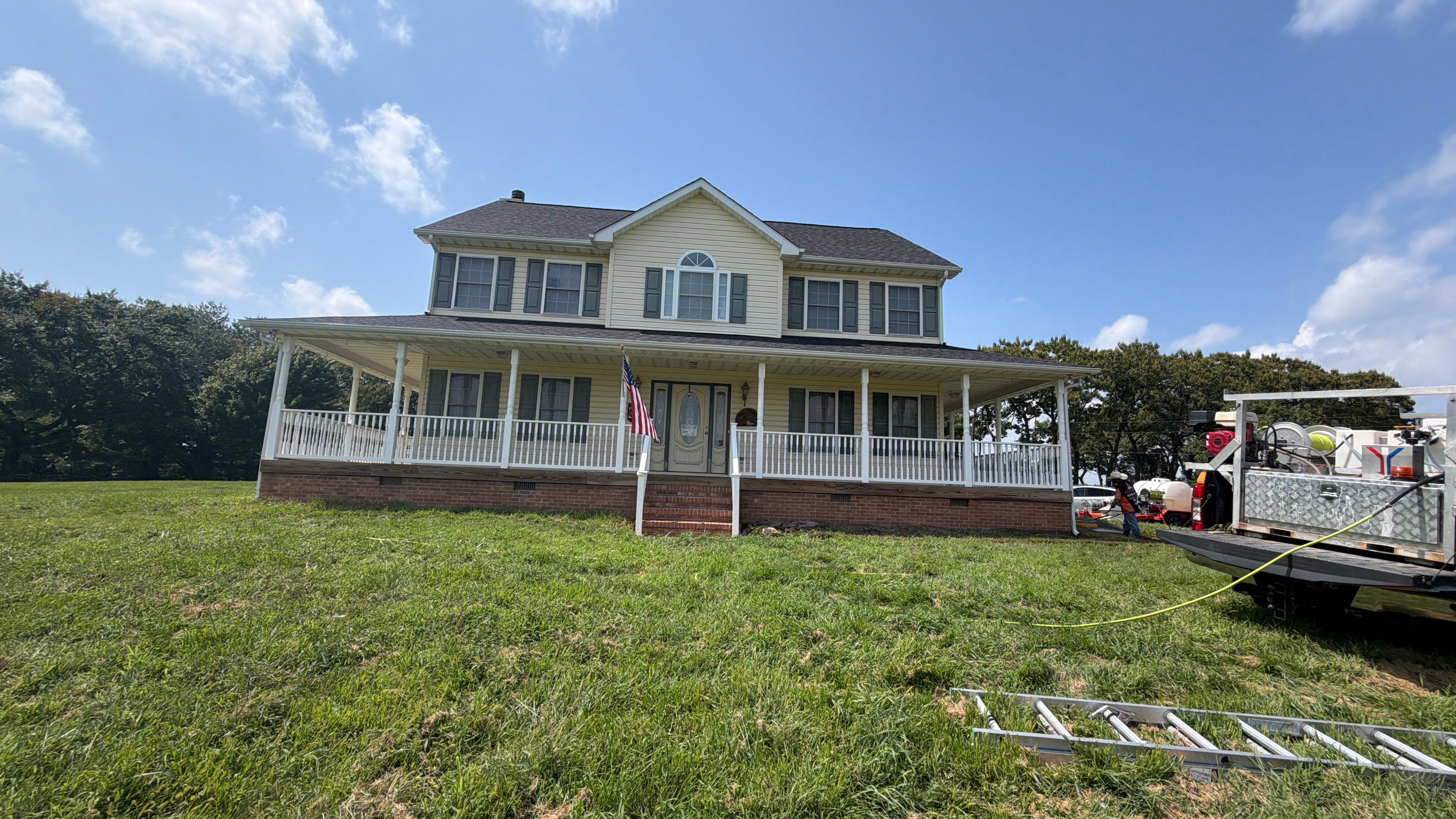 Vinyl Siding House Washing and Wood Deck Restoration in Carroll County by Baltimore Pressure Washers Inc.