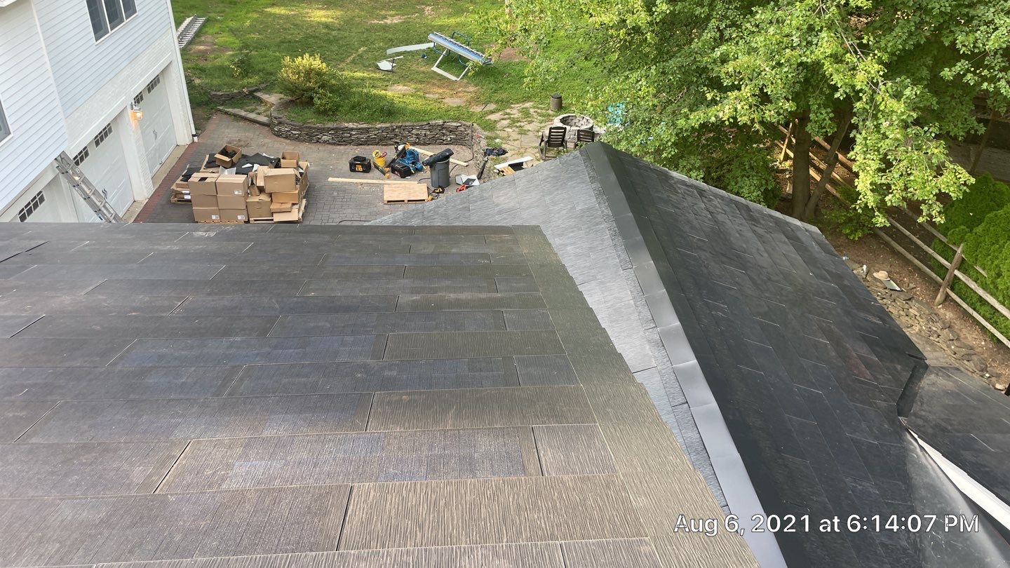 Tesla Solar Roof Replacement using Tesla Solar Roof V3 Tiles by American Home Contractors
