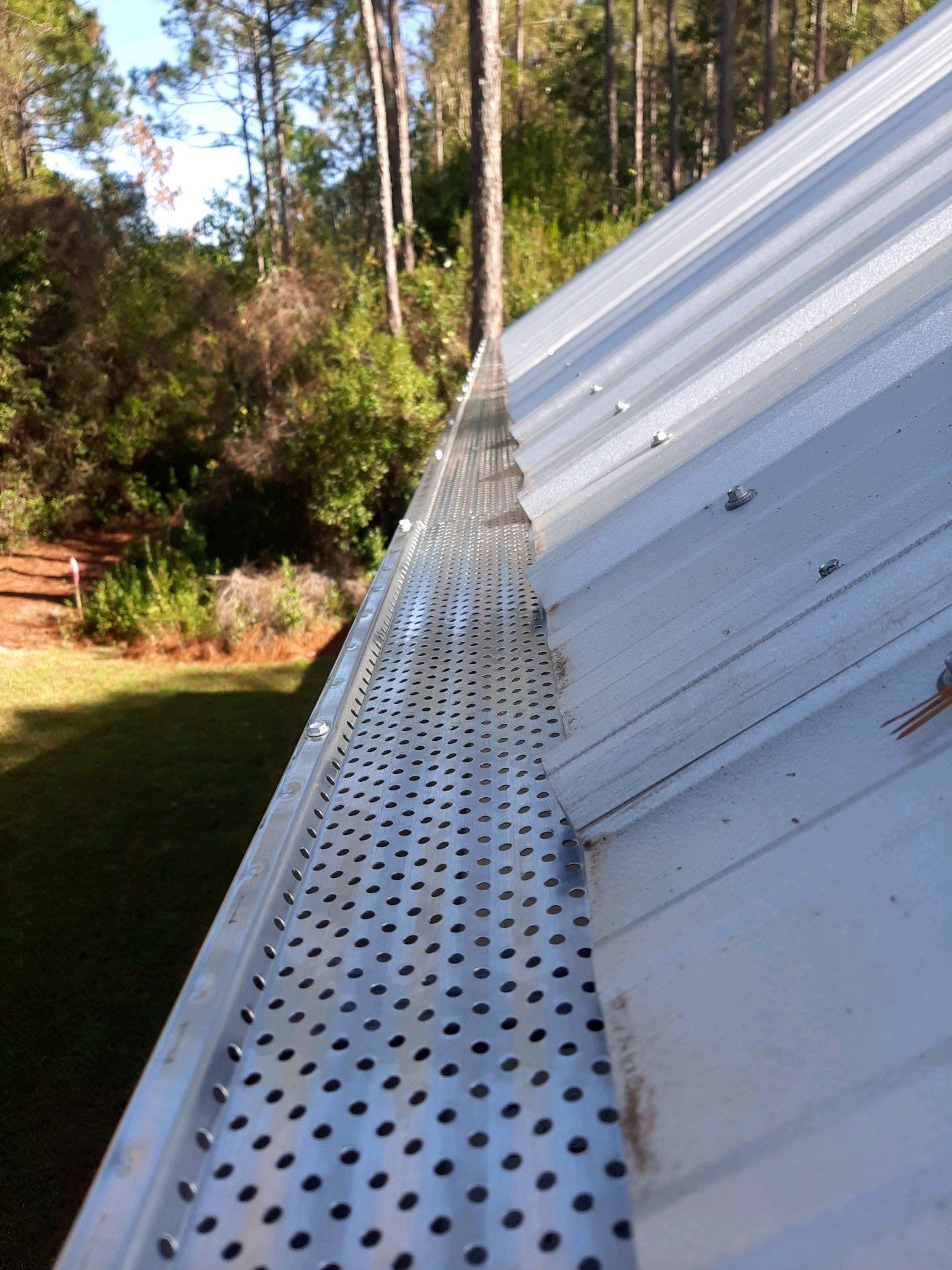 Gutter Installation using K-Style Seamless Gutters and Gutter Guards by Gutter Professors