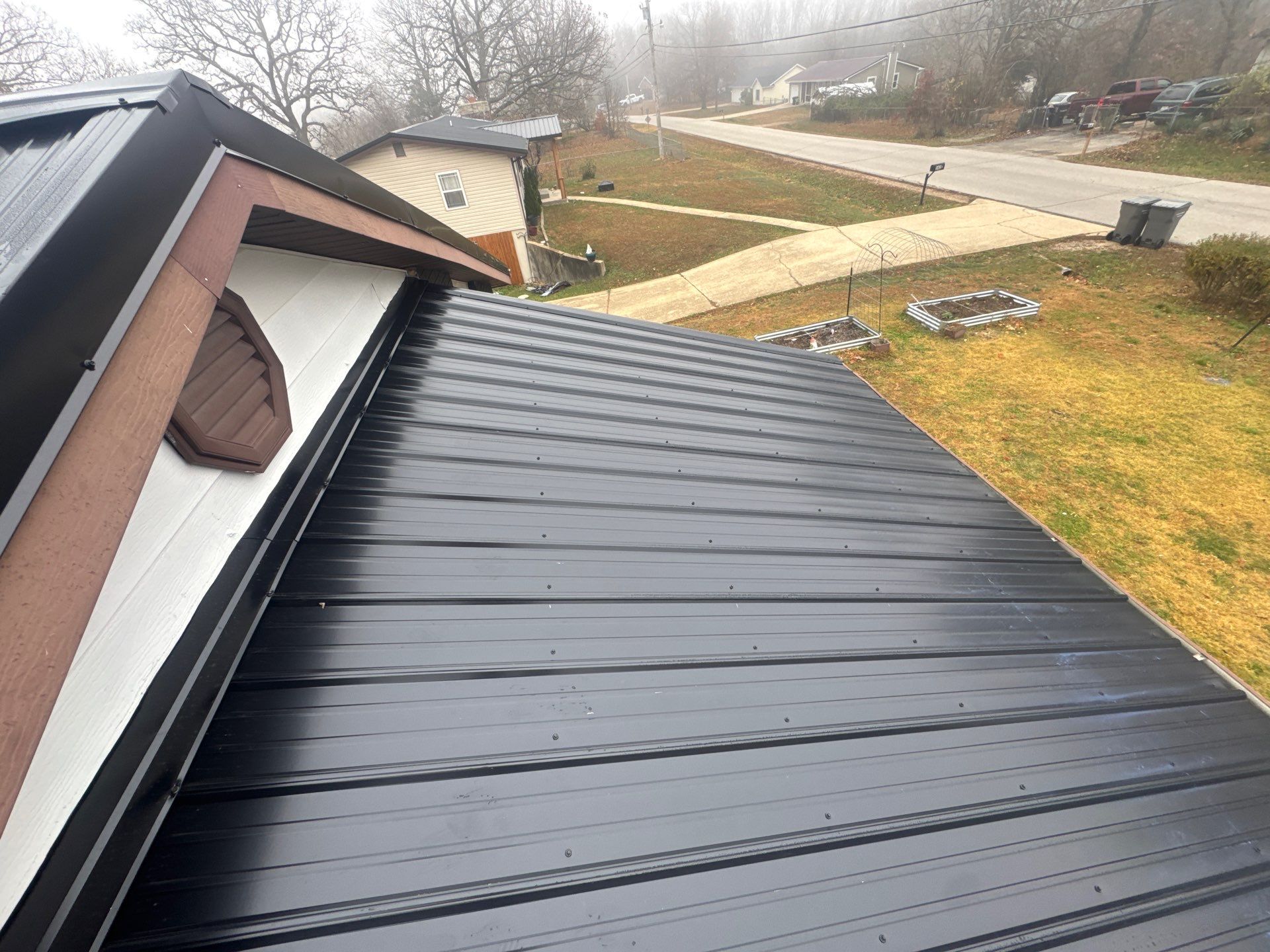 Residential Metal Roof Install - 26 Gauge G-Rib Metal - Color Shiny Black  by Titan Commercial & Residential Roofing 
