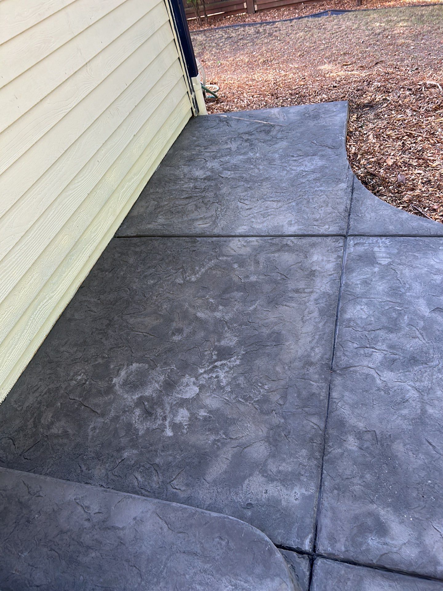 Luo | Colored Stamped Concrete Patio by Jireh Asphalt & Concrete Inc 